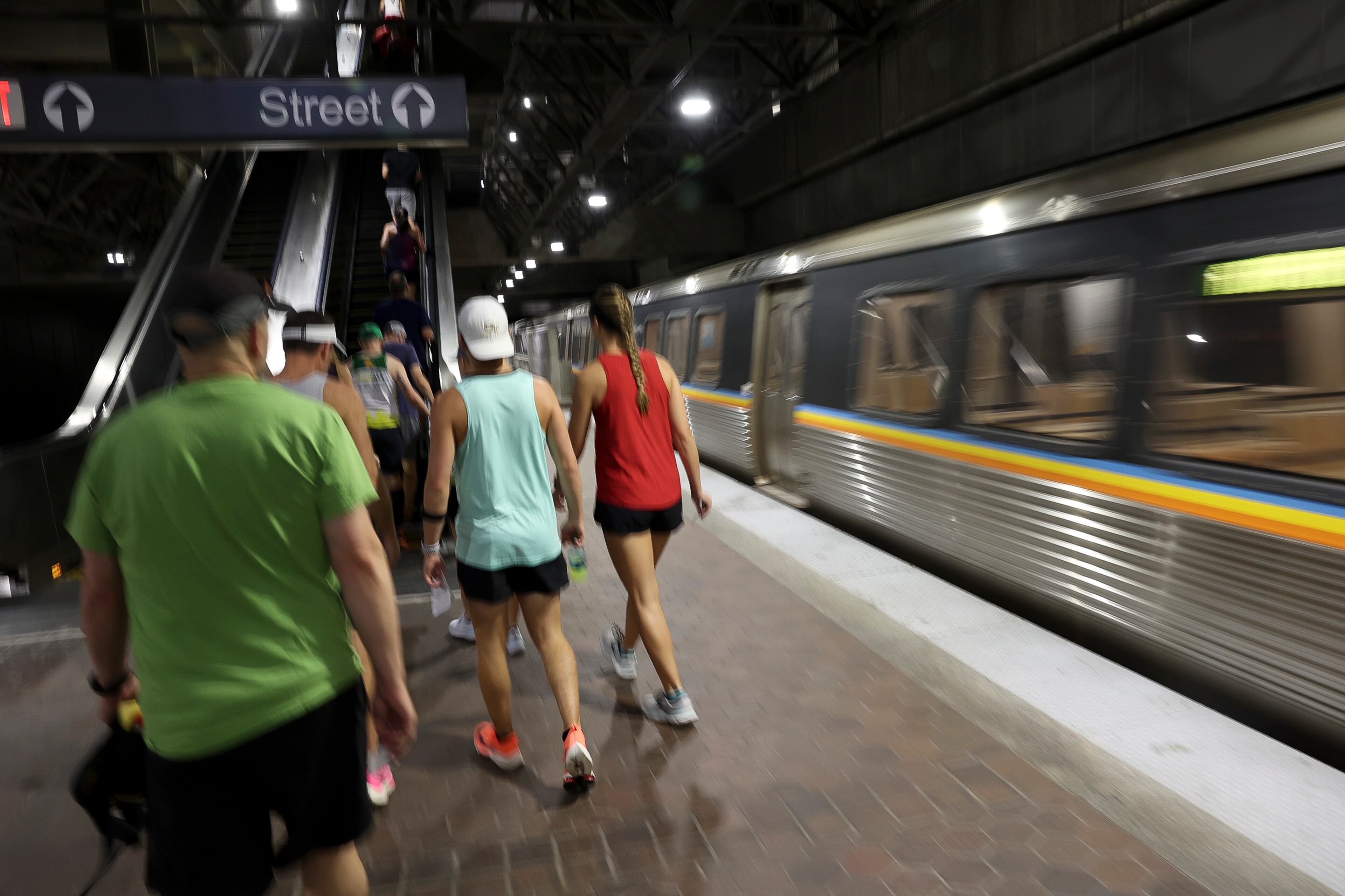 7/3/21 - Atlanta, GA - Runners take MARTA to the start as the AJC Peachtree Road Race returned in-person Saturday for the holiday tradition. (Jason Getz for the Atlanta Journal-Constitution)