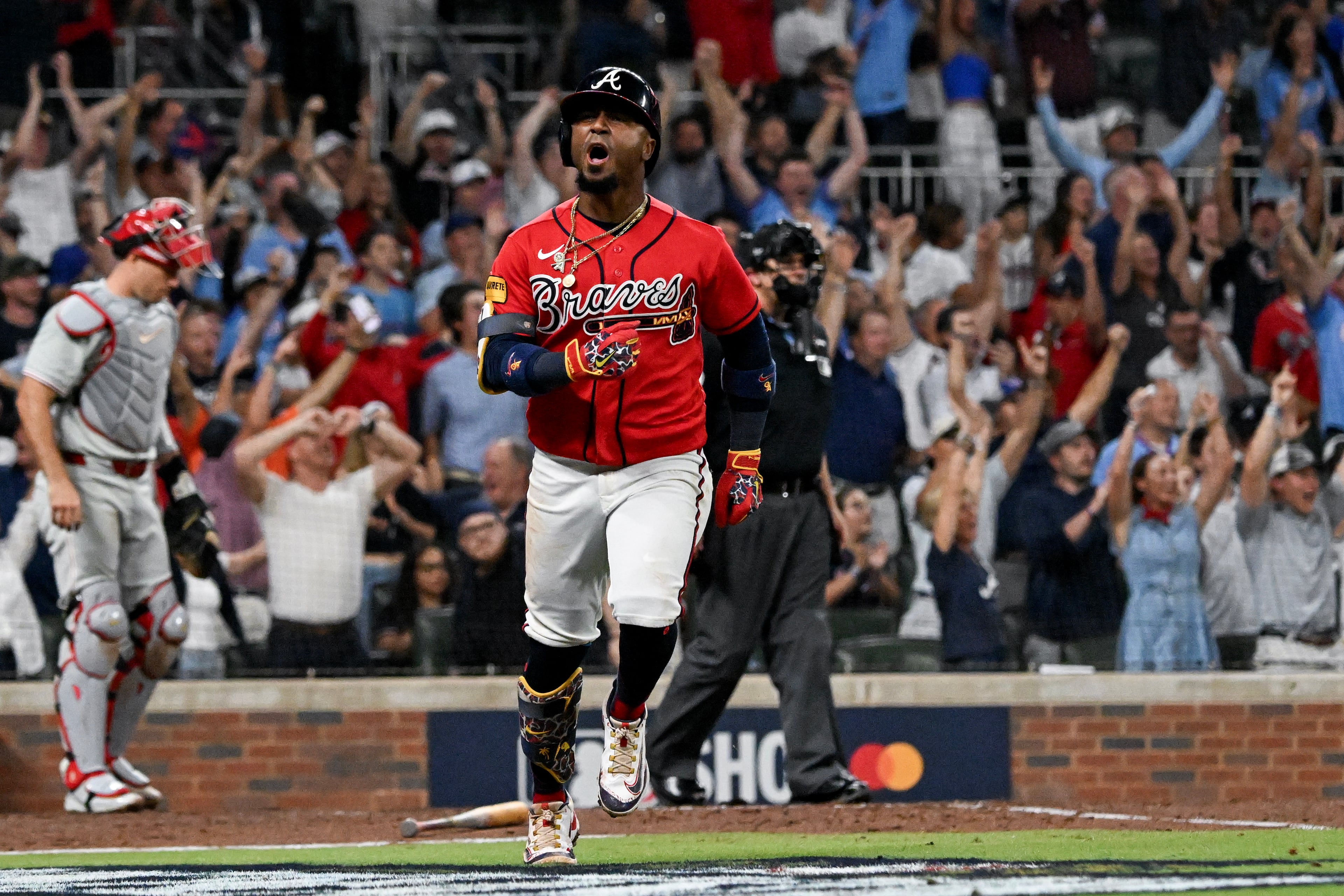 Atlanta Braves' Ozzie Albies (1) reacts after hitting a two-run home run against the Philadelphia Phillies during the fourth inning of Game 3 of a MLB National League Wild Card playoff series between the Atlanta Braves and the Philadelphia Phillies, Thursday, Oct. 1, 2026, in Atlanta. (Hyosub Shin/AJC)