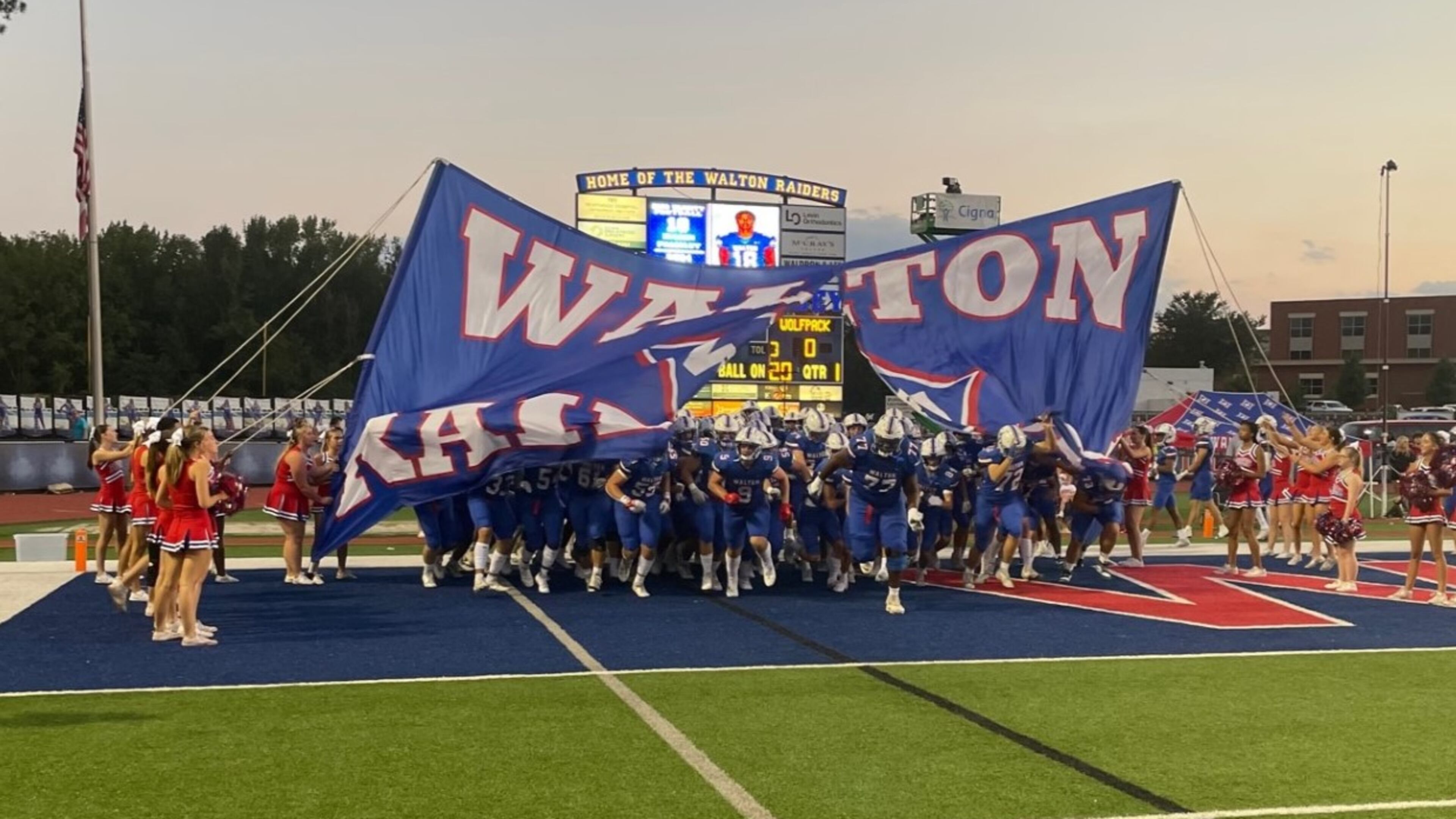 Walton players take the field for their game against North Paulding on Sept. 29, 2023, at Raider Valley in Marietta. Walton won 44-24 to improve to 5-0.