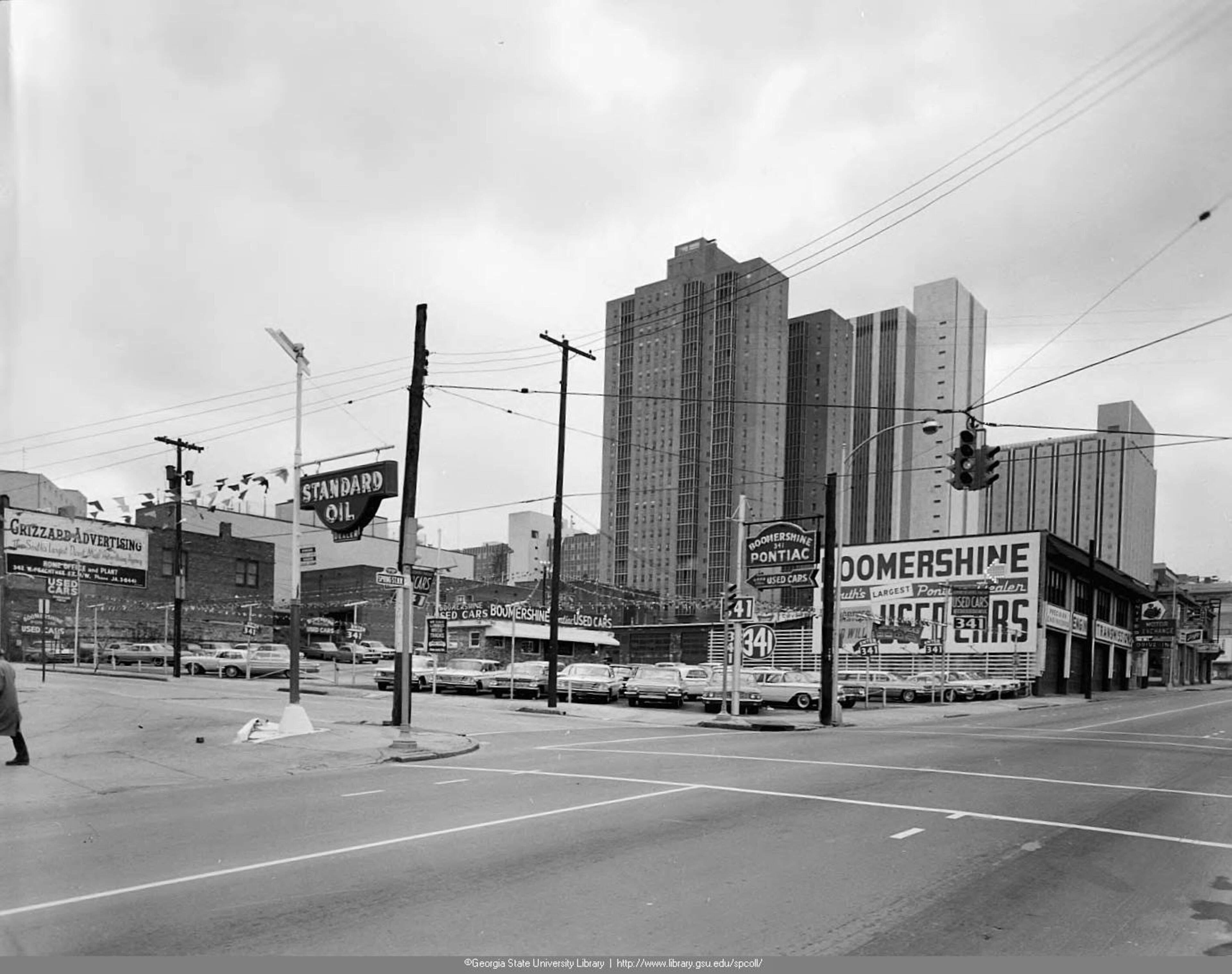 Boomershine Used Cars on Spring Street in 1964. Tracy O'Neal Photographic Collection. Special Collections and Archives, Georgia State University Library