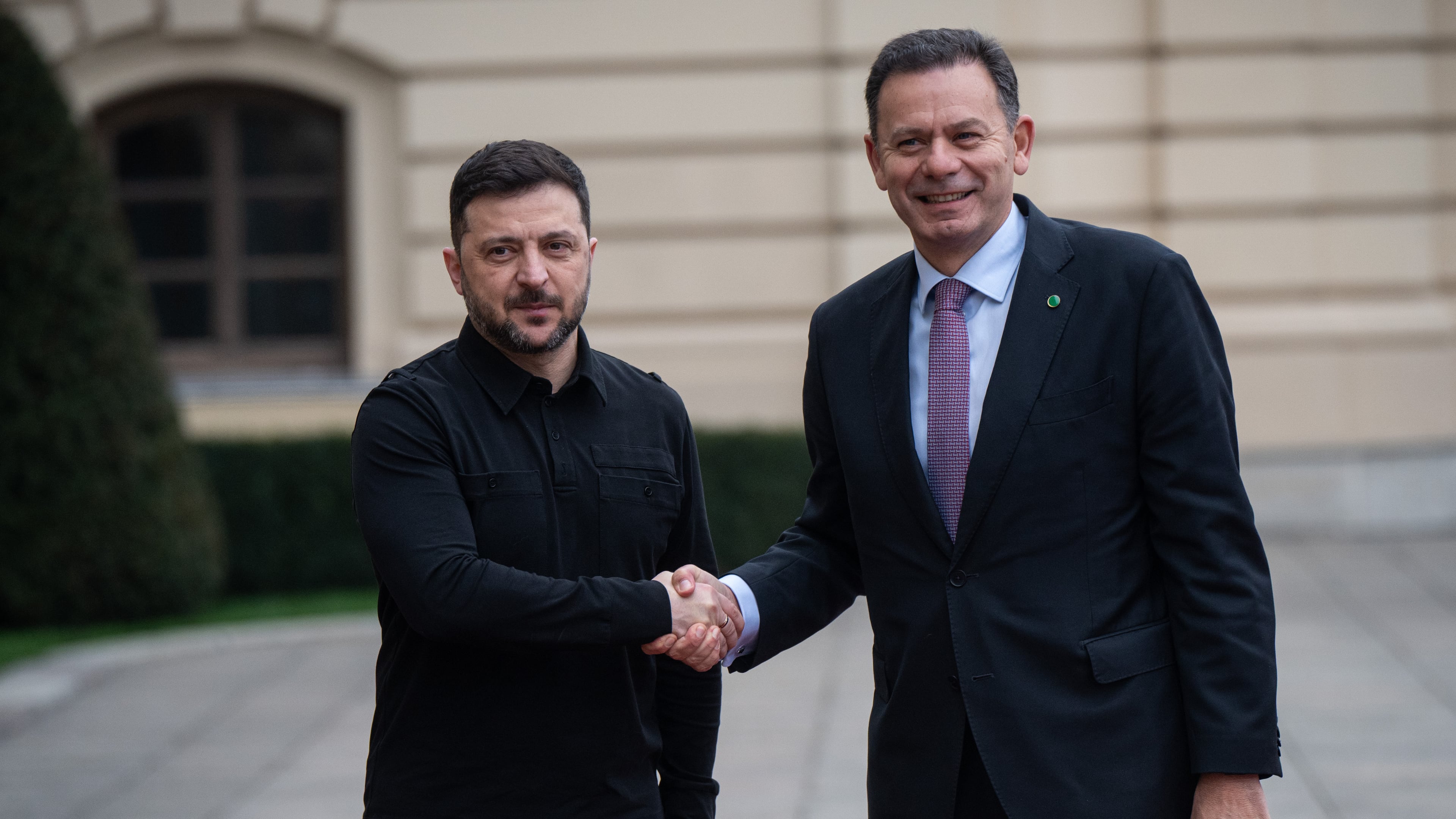 Ukraine's President Volodymyr Zelenskyy, left, shakes hands with Portuguese Prime Minister Luís Montenegro in Kyiv, Ukraine, Saturday, Dec. 20, 2025. (AP Photo/Danylo Antoniuk)