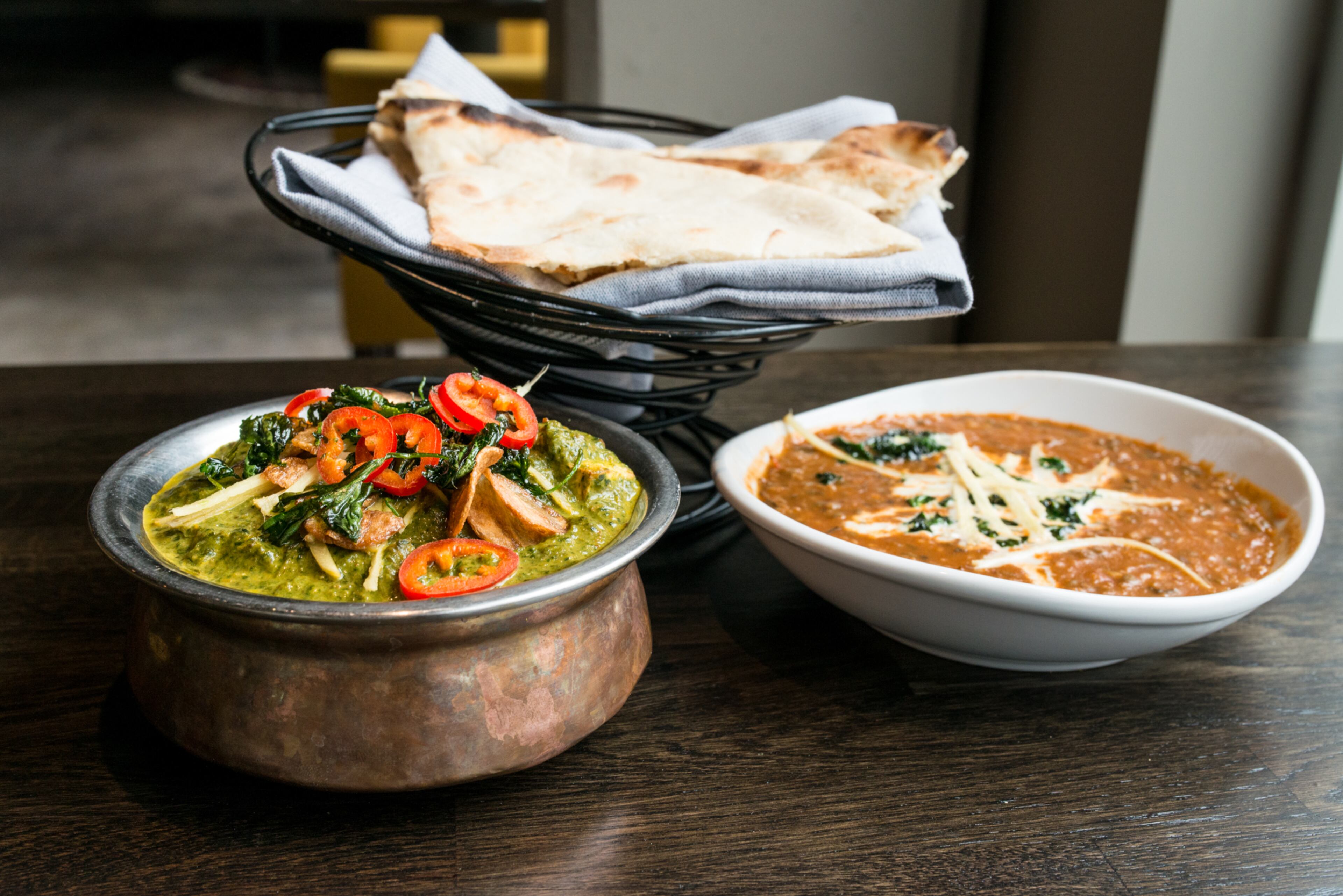 Saag with paneer, 24 hour lentils, and Naan at Amara. / Photo credit- Mia Yakel.