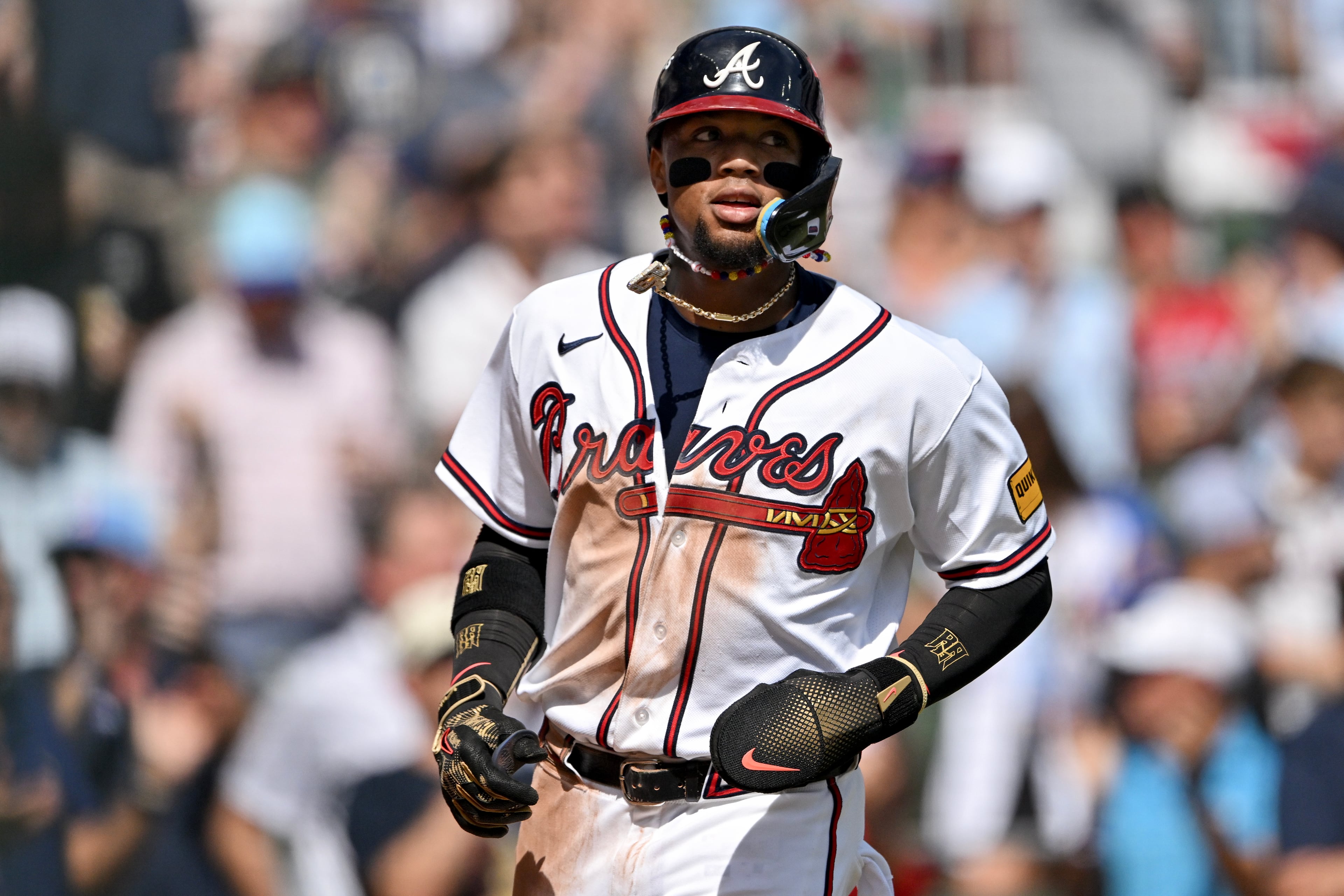 Braves right fielder Ronald Acuña Jr. scores against the Phillies during Game 2 of their NL Wild Card Series on Wednesday, Sept. 30, 2026, in Atlanta. (Hyosub Shin/AJC)