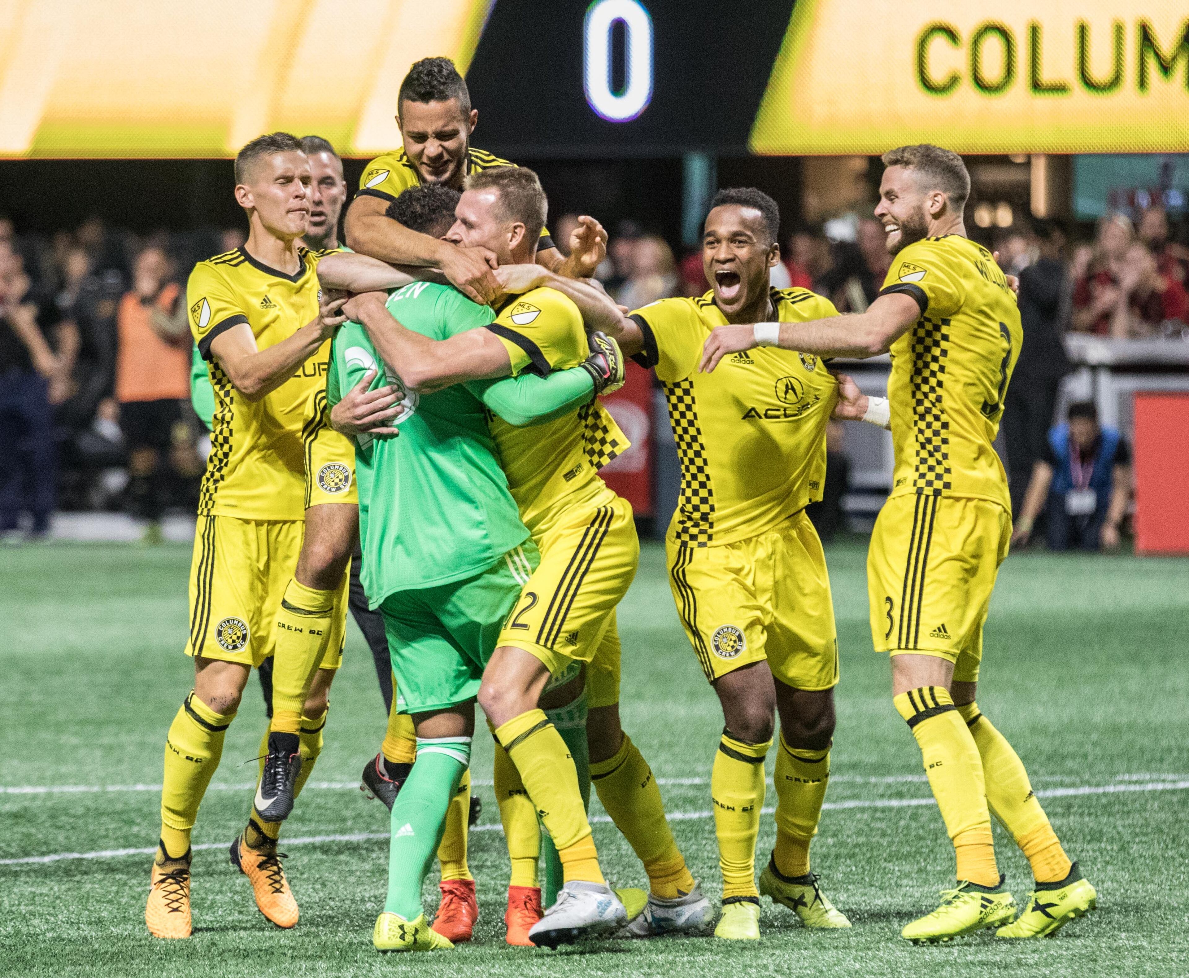 Columbus Crew players celebrate after defeating Atlanta United during a MLS playoff game at Mercedes-Benz Stadium, Thursday, Oct. 26, 2017, in Atlanta. BRANDEN CAMP/SPECIAL
