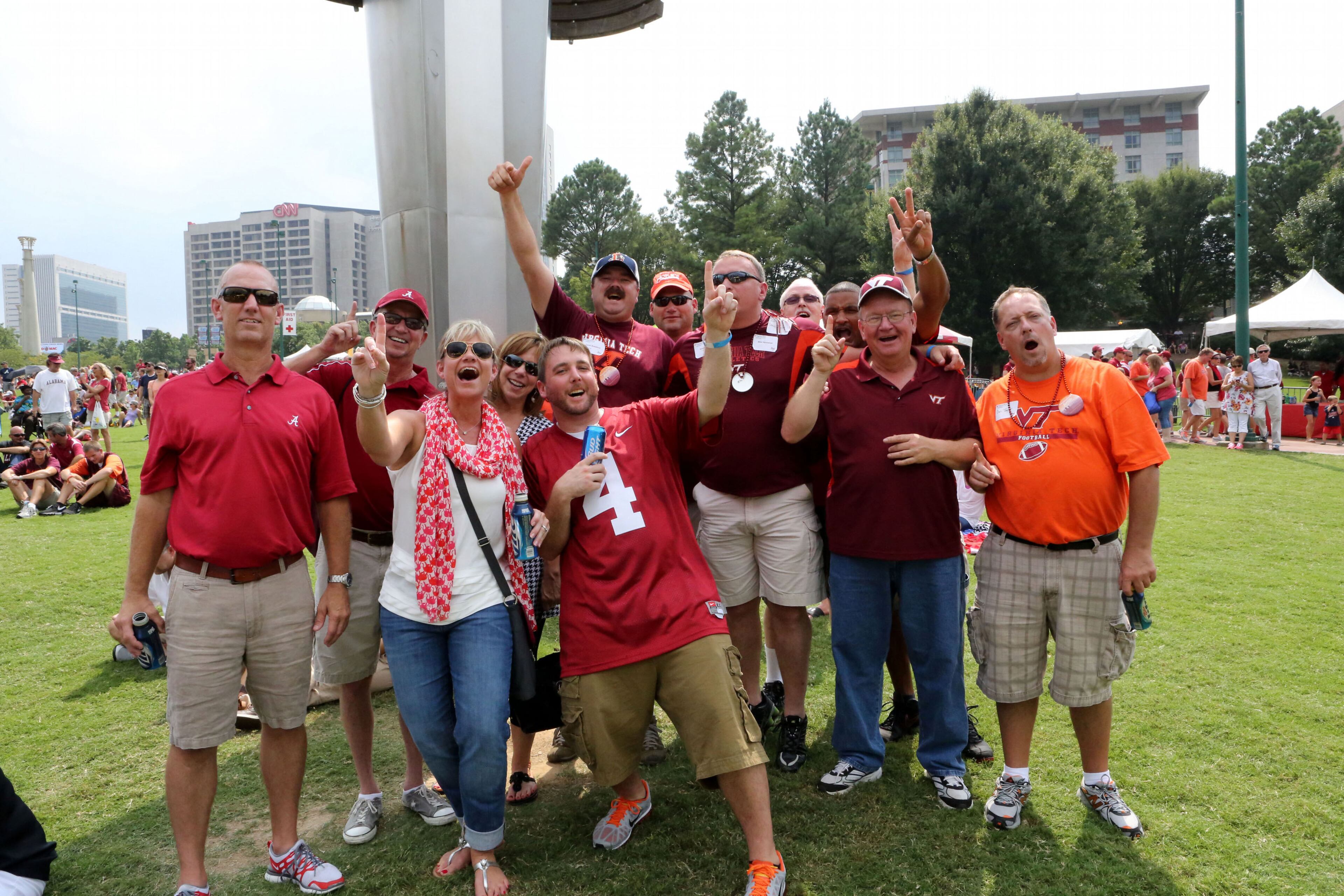 Fans from both schools enjoy the free activities at Centennial Olympic Park on Saturday where Sheryl Crow headlined the Chick-fil-A Kickoff concert.
