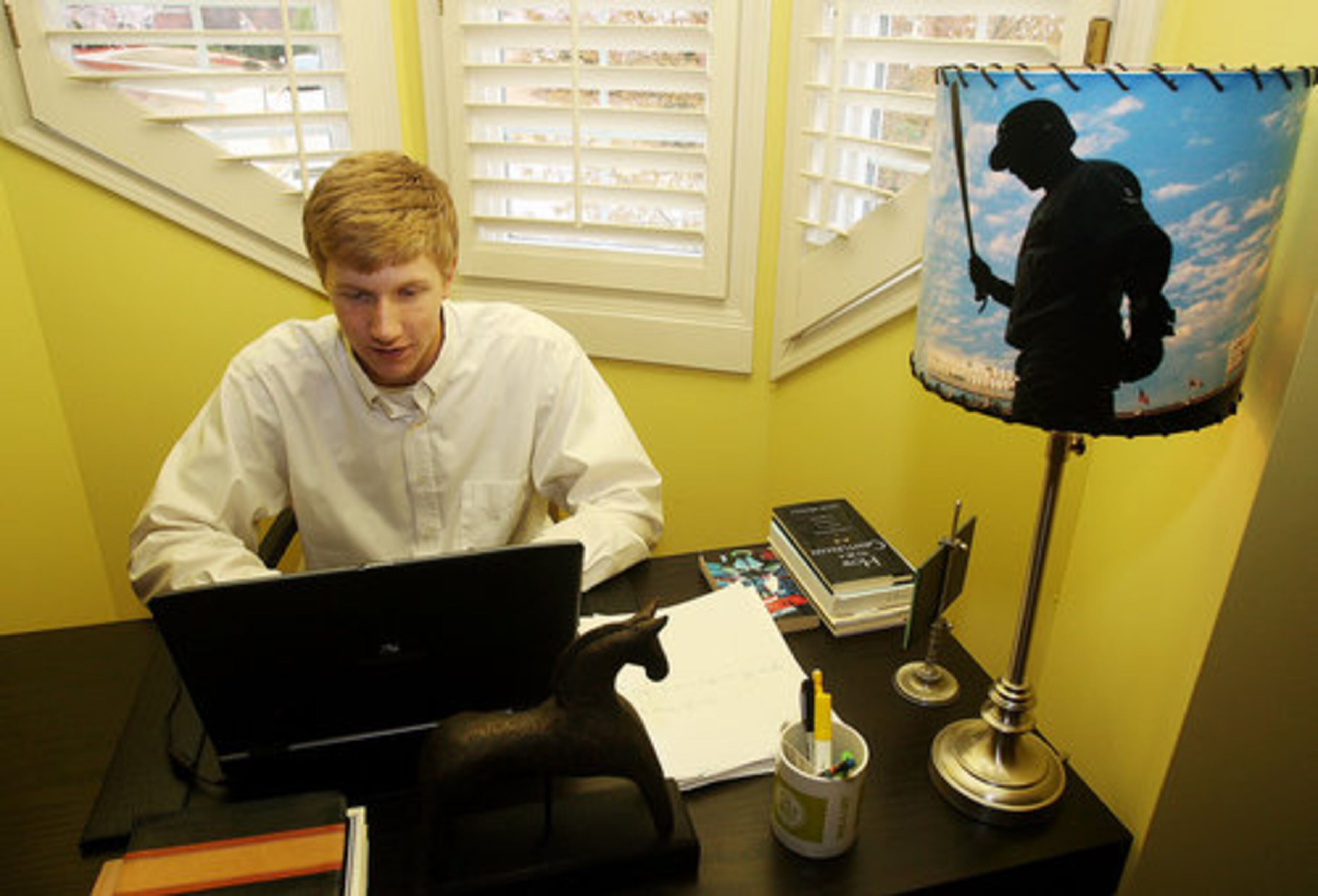 Busy teens, like Tanner Smith shown here in his Vern Yip-designed activity room, may need to have snacks close at hand. Where possible, Singleton recommends a small refrigerator and a secure cabinet space for food and beverage storage. "Definitely with teens, they're going to bring food up there anyway," Singleton said.