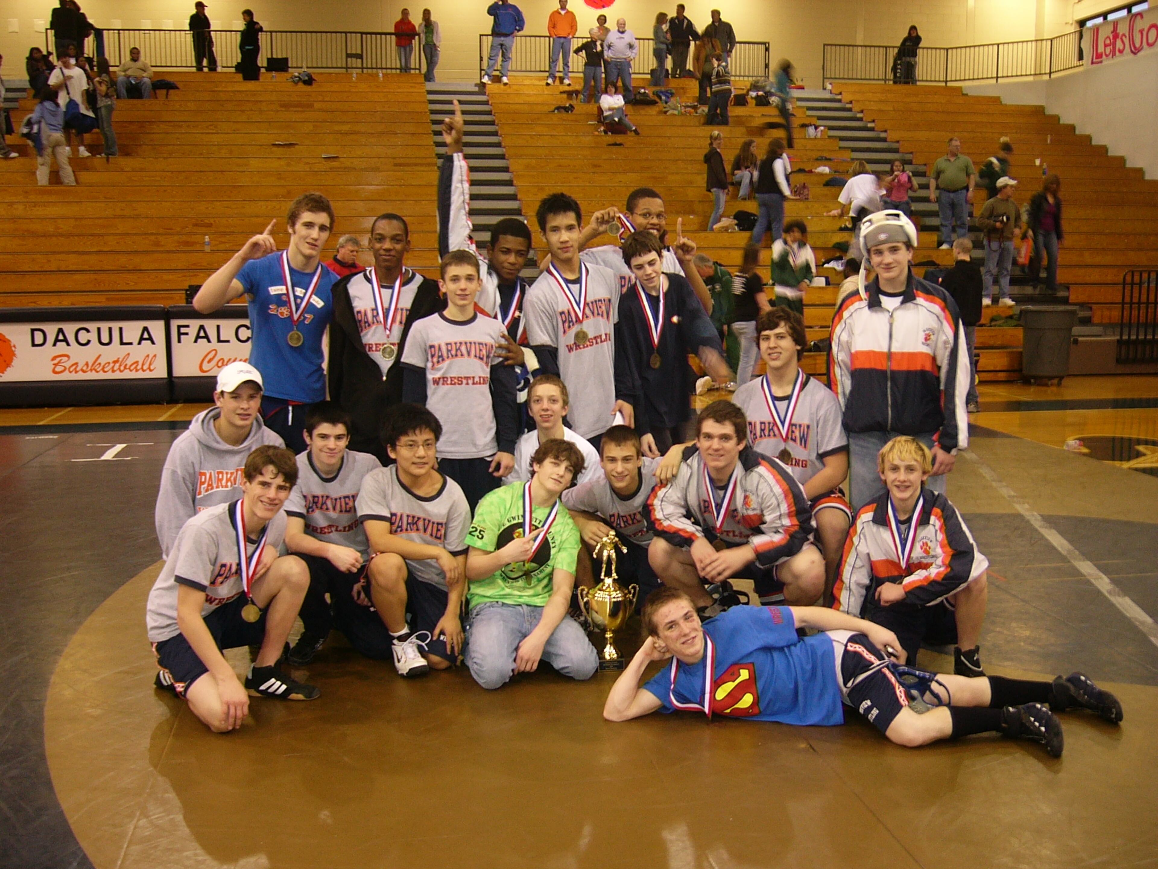 When Parkview High School won the freshman Gwinnett County wrestling tournament in 2008, Victor (middle, back row) placed first in the 140-pound weight class. PHOTO COURTESY OF VIVIAN TRINH