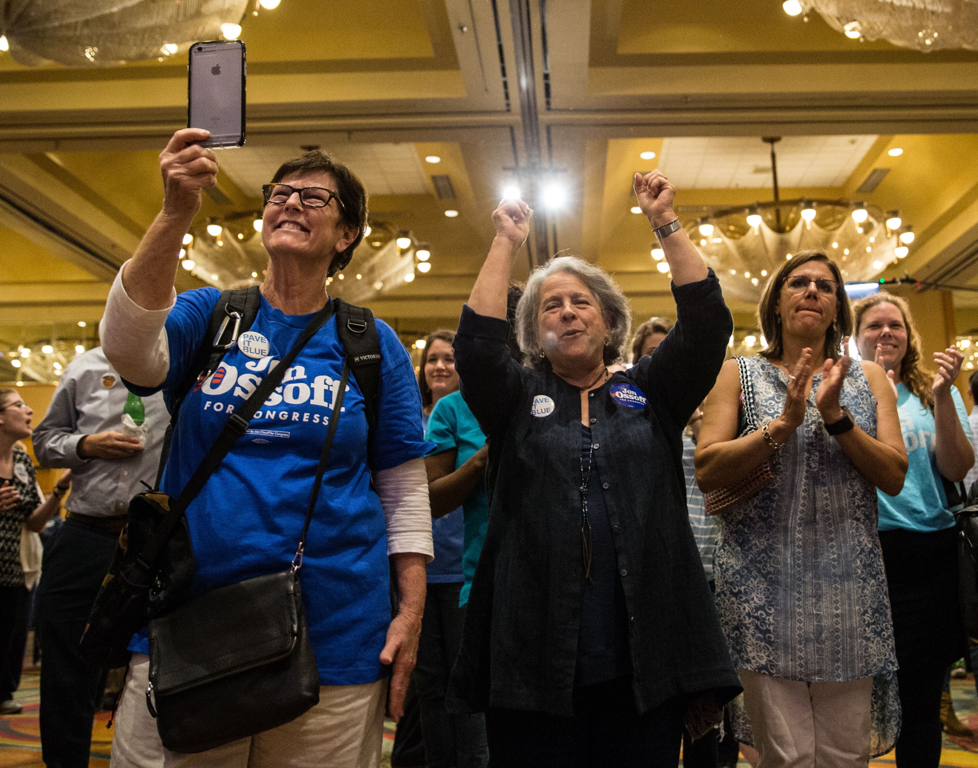 Supporters of Democratic candidate for Georgia's Sixth Congressional Seat Jon Ossoff, who is running to replace former U.S. Rep. Tom Price, cheer during an election party, Tuesday, April 18, 2017, in Atlanta. BRANDEN CAMP/SPECIAL