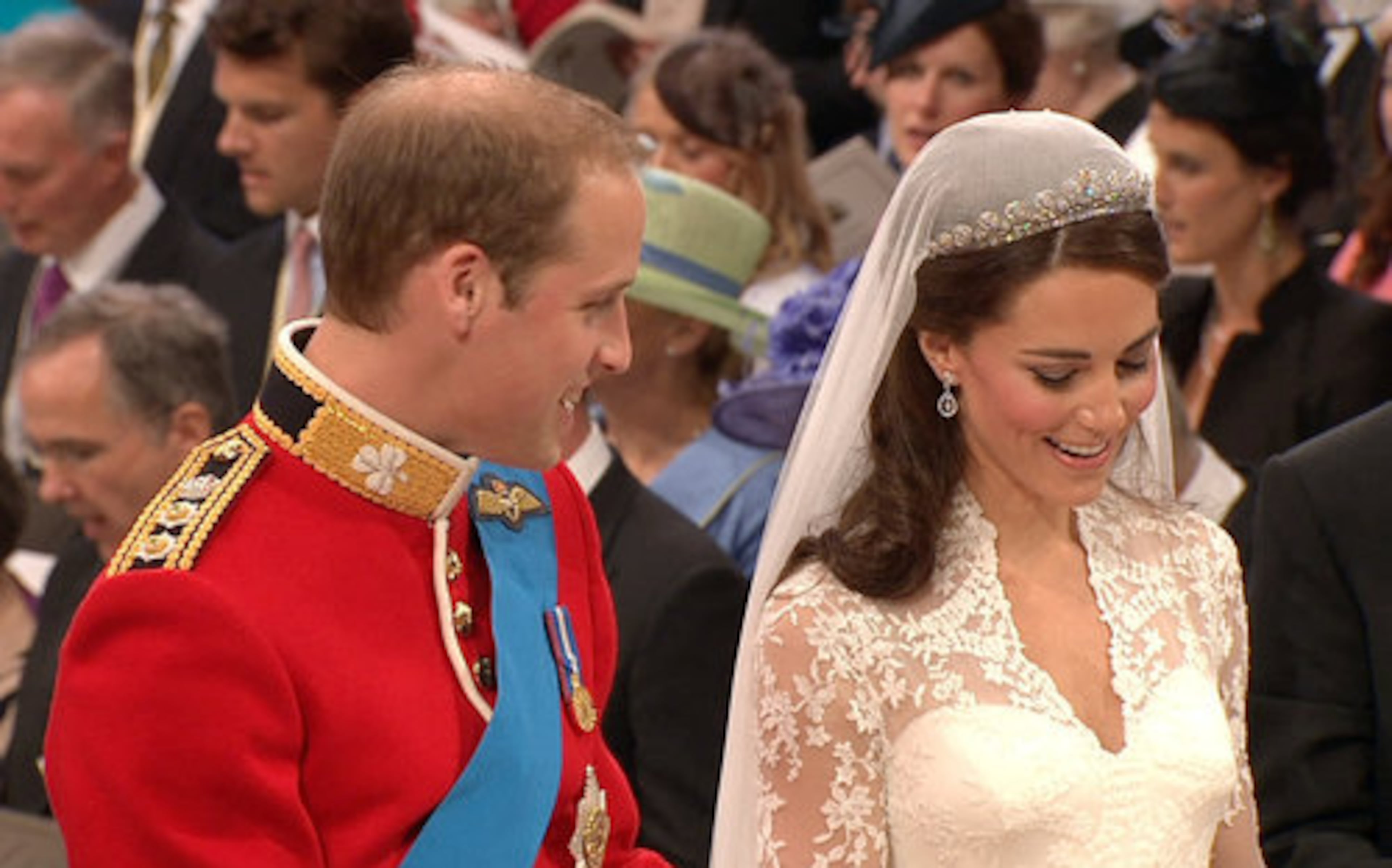 Britain's Prince William looks at his bride, Kate Middleton, as they stand at the altar at Westminster Abbey for the Royal Wedding in London on Friday, April, 29, 2011.