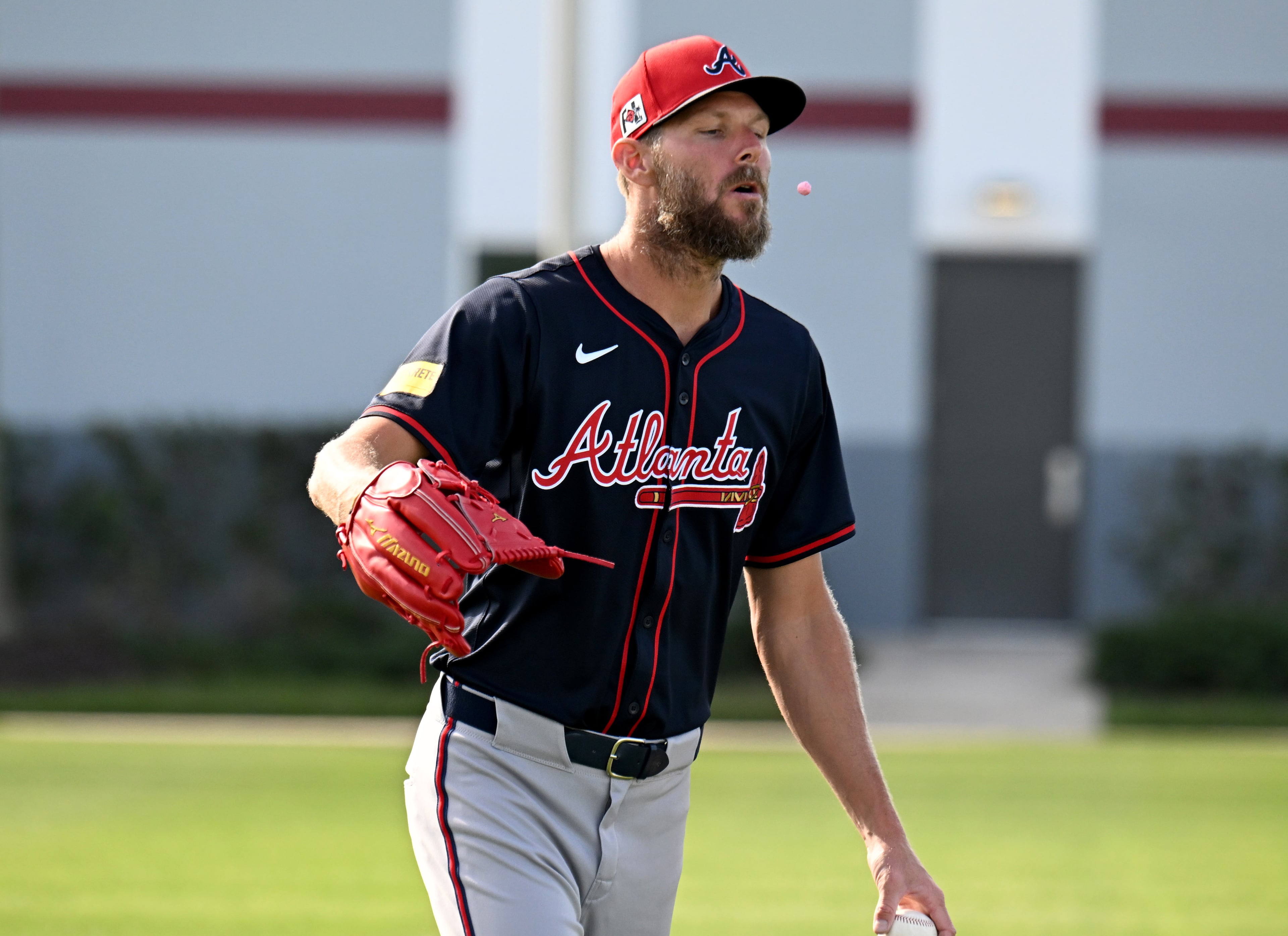 Atlanta Braves pitcher Chris Sale drops his gum and then kicks it for fun during spring training workouts at CoolToday Park, Saturday, February 15, 2025, North Port, Florida. (Hyosub Shin / AJC)