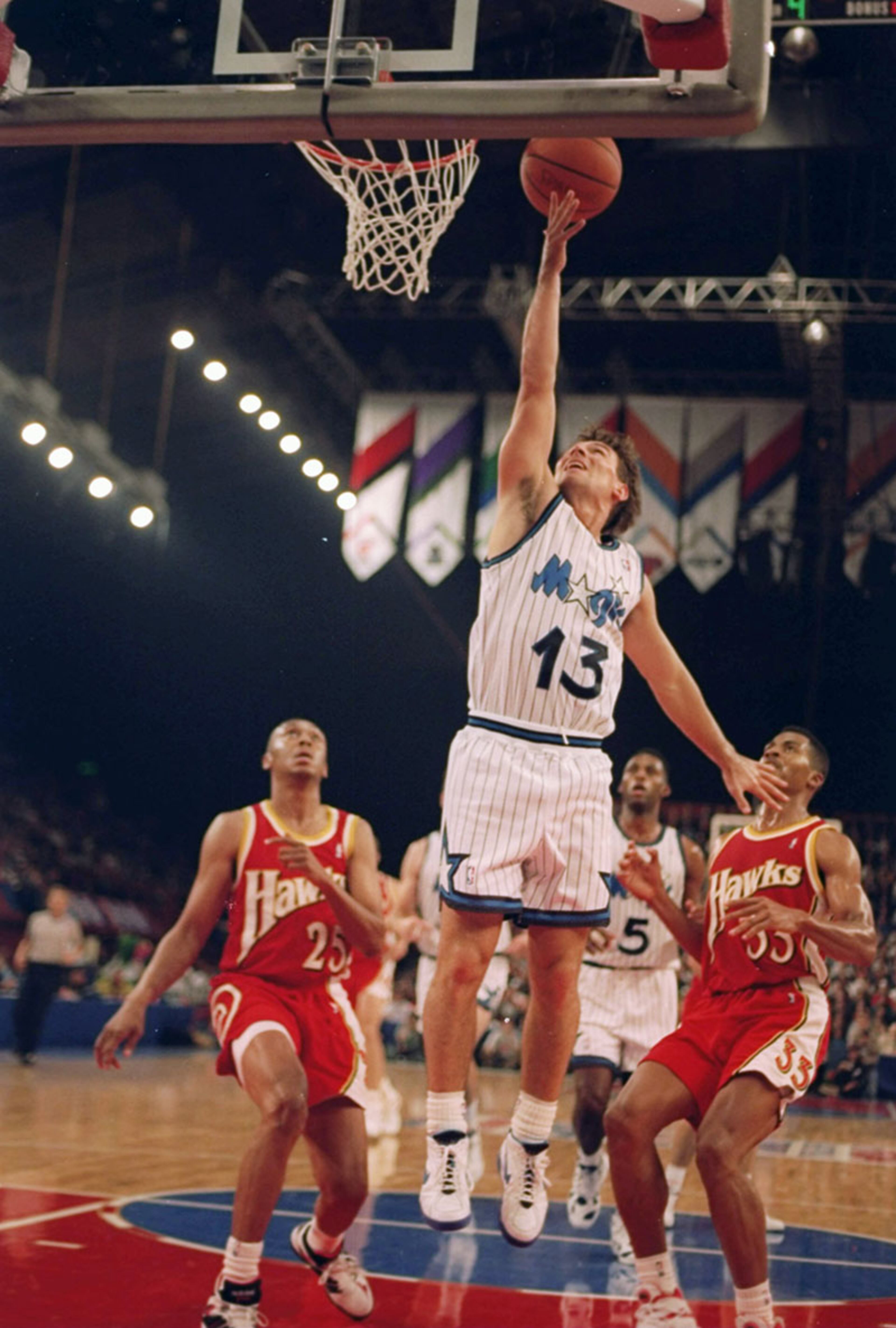 Oct . 30, 1993: Orlando's Mike Iuzzolino goes up for the tip-in as the Magic trounced the Hawks 120-95 in the first NBA game played in the United Kingdom - before a crowd 9,483 spectators that virtually stayed until the end.