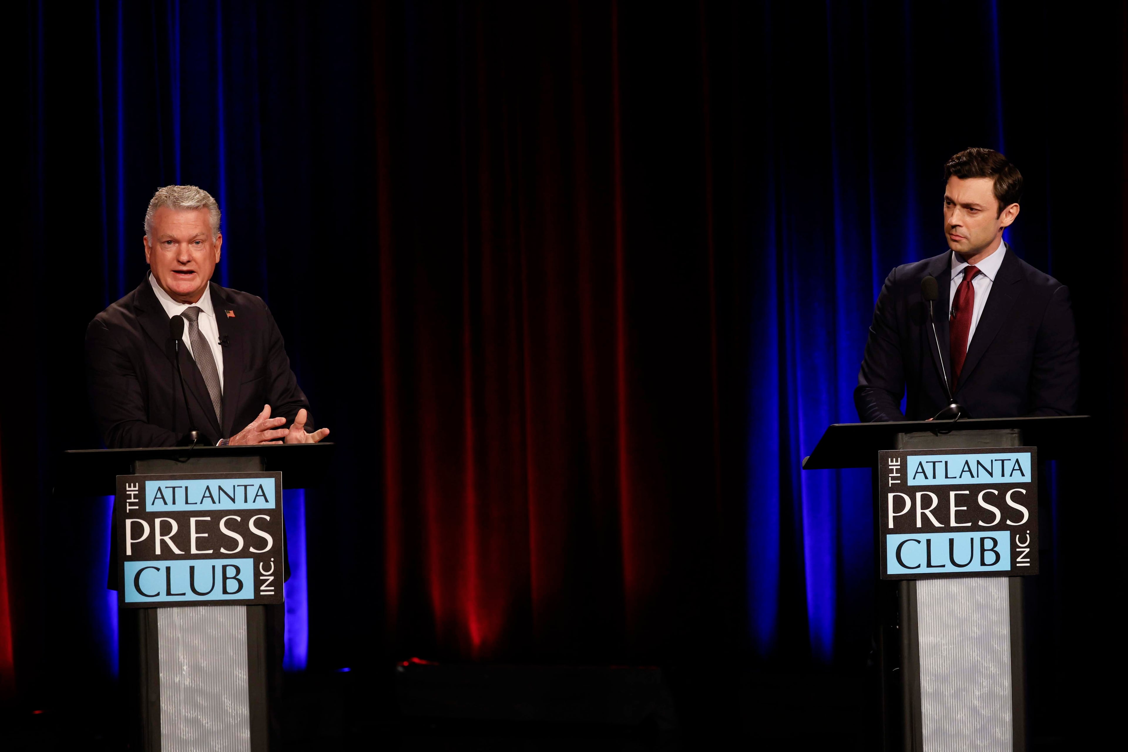 Republican U.S. Rep. Mike Collins (left) debates incumbent Democratic U.S. Sen. Jon Ossoff during the second day of the Atlanta Press Club debates at the Georgia Public Broadcasting studio in Atlanta on Tuesday. (Miguel Martinez/AJC)