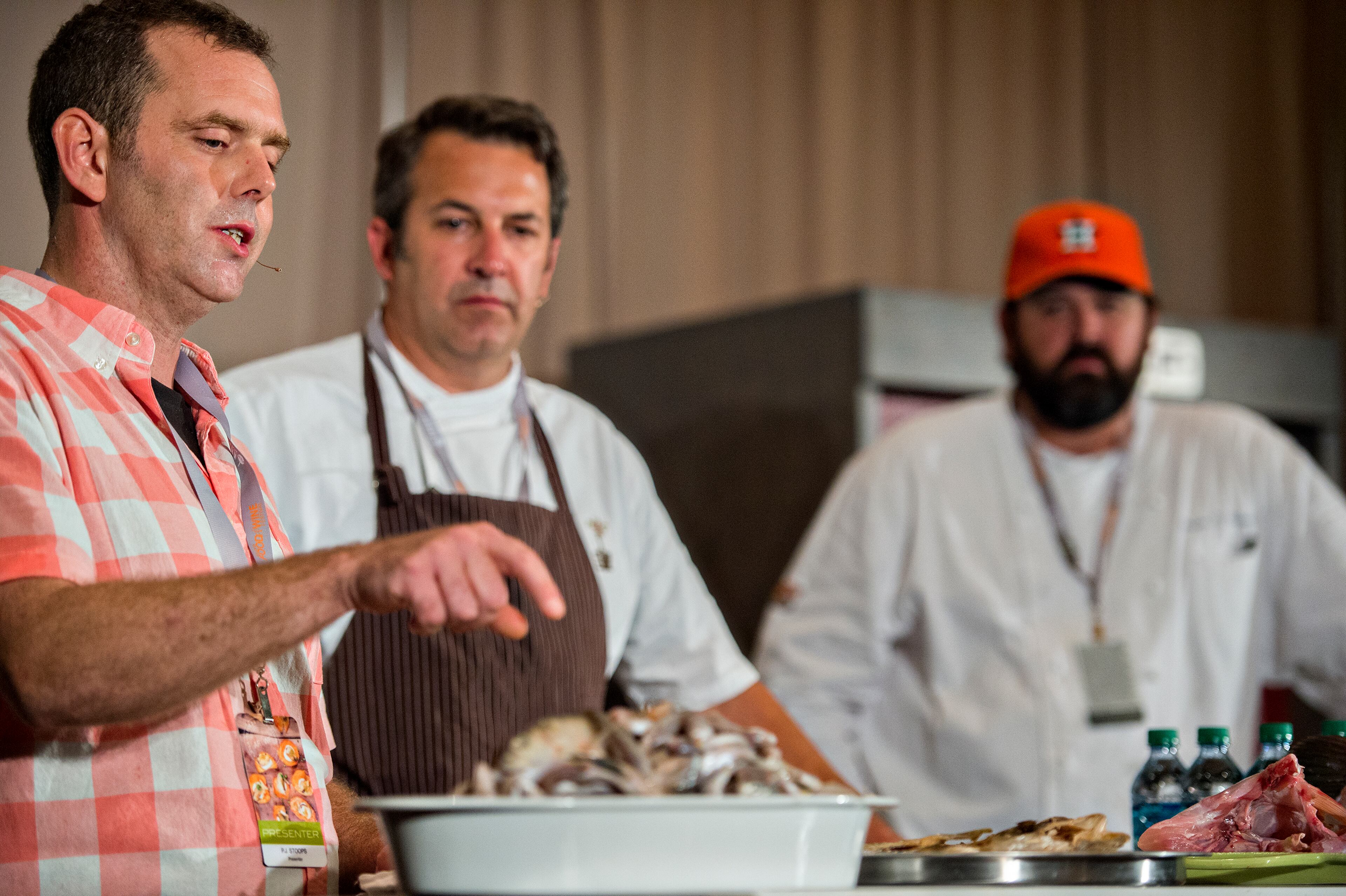 May 30, 2015 Atlanta - PJ Stoops (left), and chefs Kevin Johnson and Bryan Caswell talk about what was once considered worthless fish during Trash Fish: A Chef's Treasure demonstration at the Atlanta Food & Wine Festival at Loews Atlanta Hotel in Midtown on Saturday, May 30, 2015.