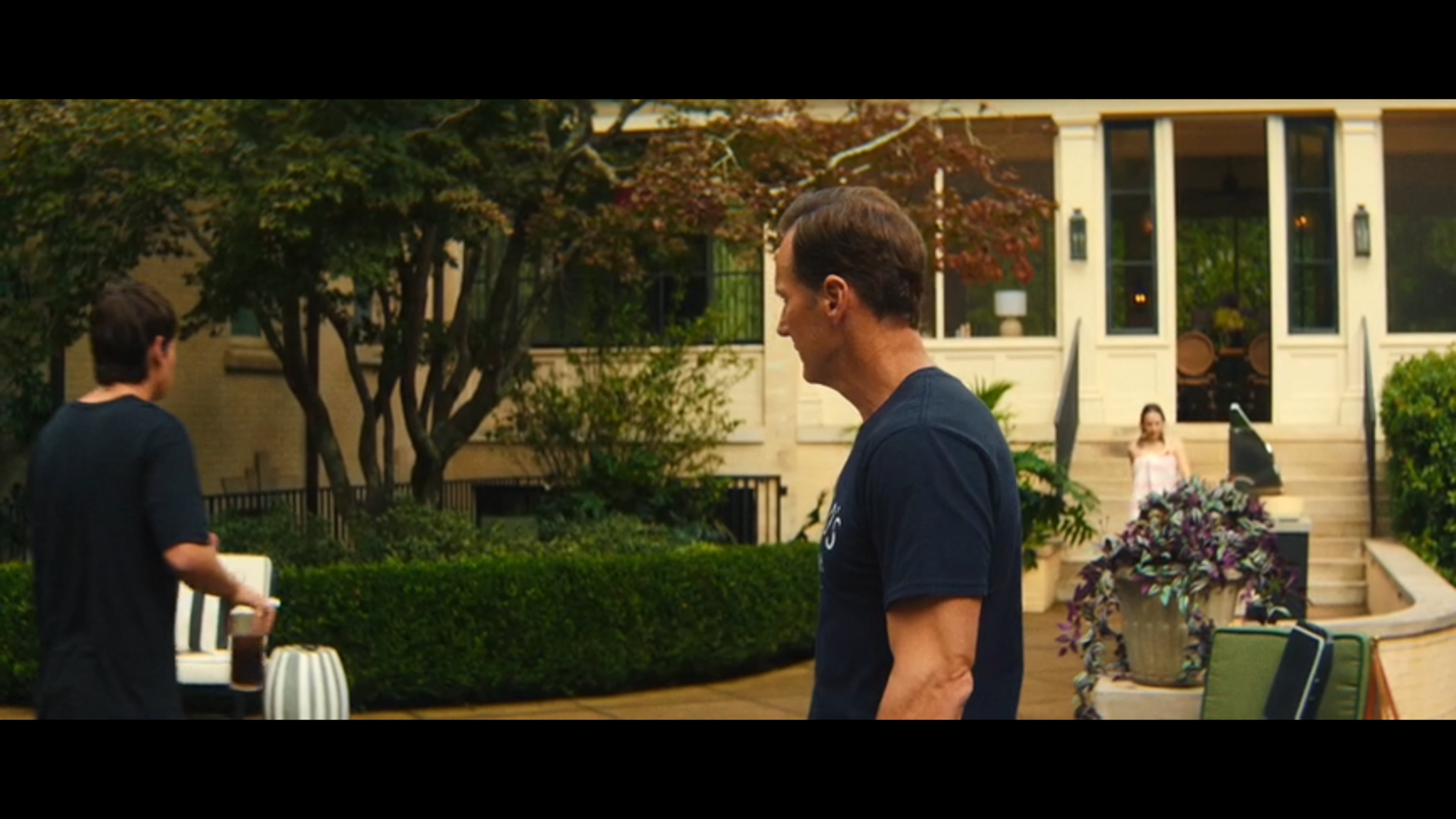 Actor Patrick Wilson stands in the backyard of an Inman Park home used as his family's home base in the Apple TV series "Cape Fear." Fake Spanish moss was added to trees to make it look like it's Savannah. (Courtesy of Apple TV)