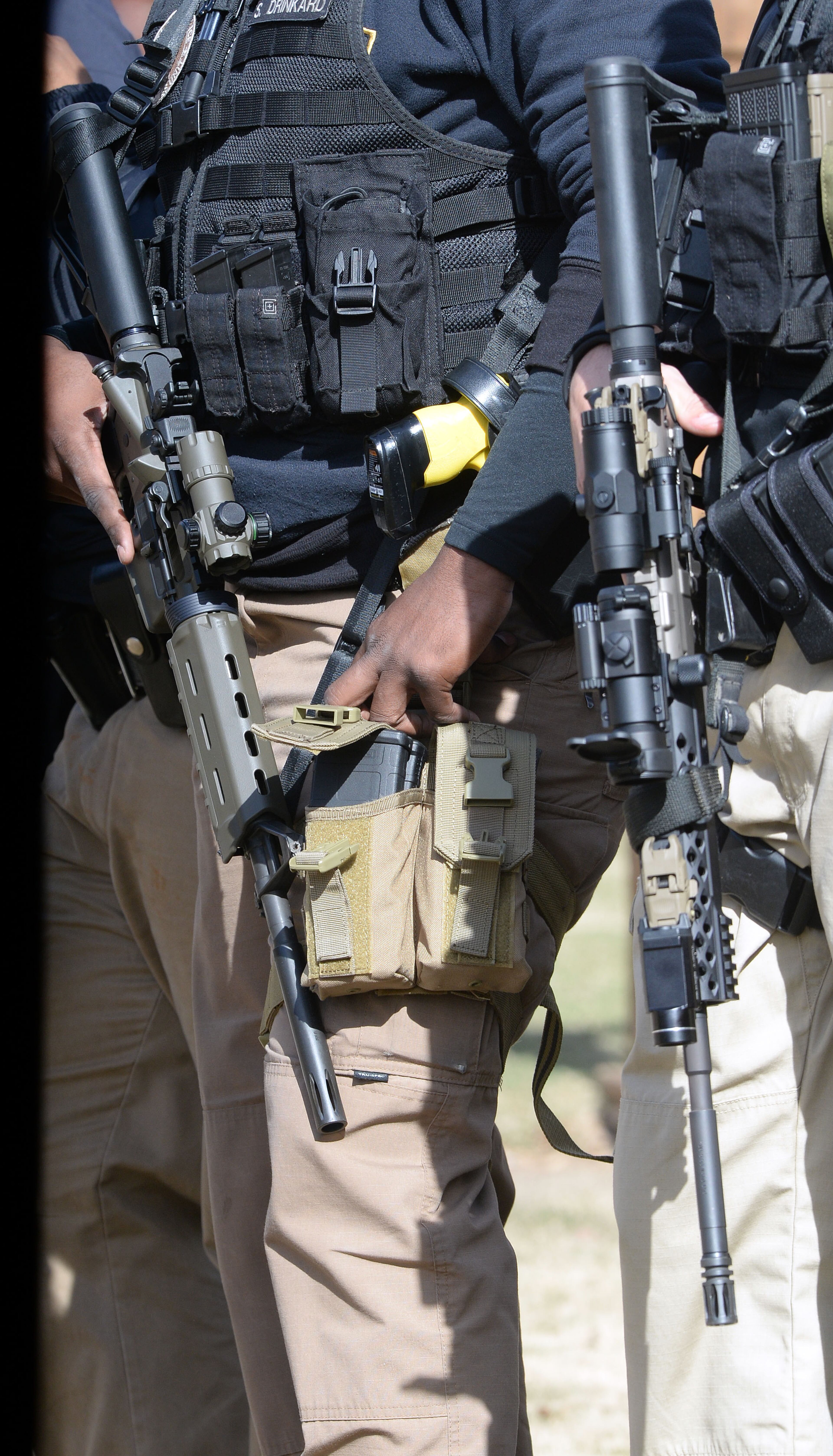 November 24, 2015 ATLANTA Officers hold their weapons while waiting for their turn in the rotation. Officers with the Atlanta Police Department conduct advanced patrol rifle training at its firearms range Tuesday, November 24, 2015. The training was scheduled prior to the terrorist attacks in Paris and is for Department personnel who are equipped with enhanced weaponry. The patrol rifle training focused on enhancing officer skills when responding to active shooter incidents. The training included modules related to engaging multiple targets and increasing the officers speed in target acquisition, threat elimination, and reloading. The training is conducted regularly to ensure Atlanta patrol officers and members of specialized response units are prepared to respond to any occurrence where citizens of the city are targeted in an active shooting event. KENT D. JOHNSON/ kdjohnson@ajc.com