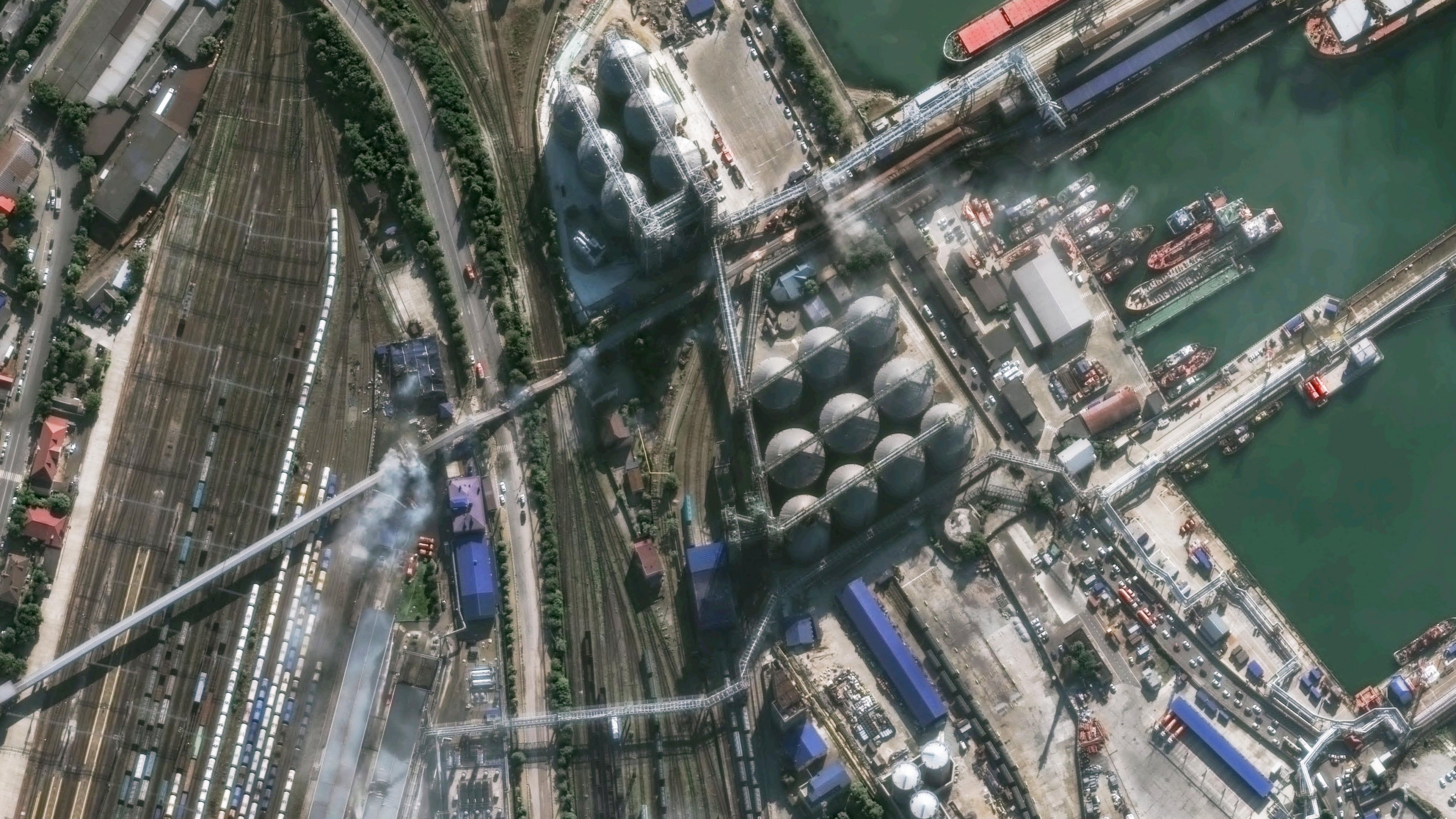This image provided by Vantor shows smoke in an overview of port infrastructure in Novorossiysk, Russia, Wednesday, Aug. 12, 2026. (Satellite image ©2026 Vantor via AP)