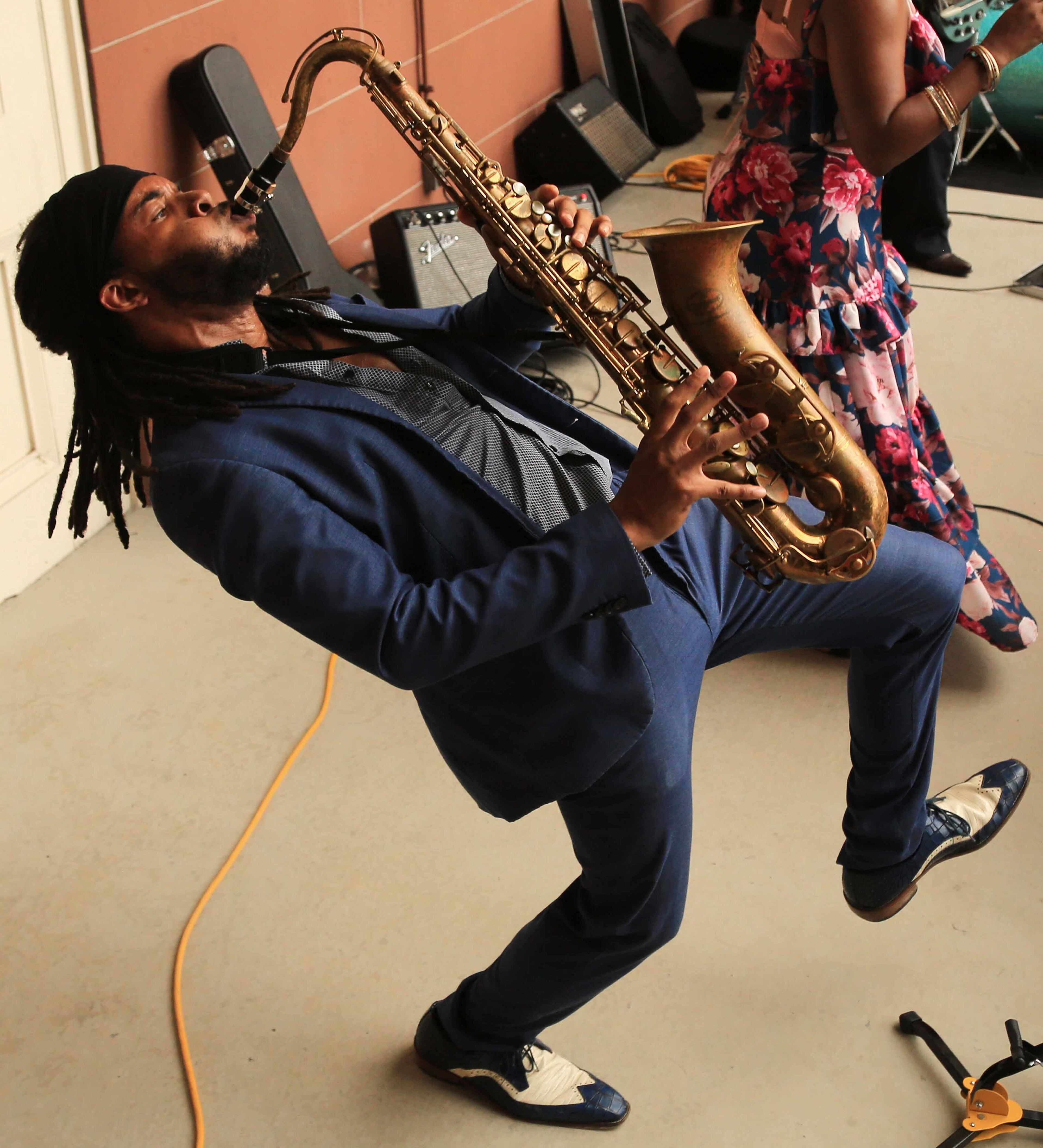 Tajh Derosier, saxophonist for Sierra Green & The Soul Machine, performs at a balcony concert at the New Orleans Jazz Museum.
Courtesy of Eliot Kamenitz