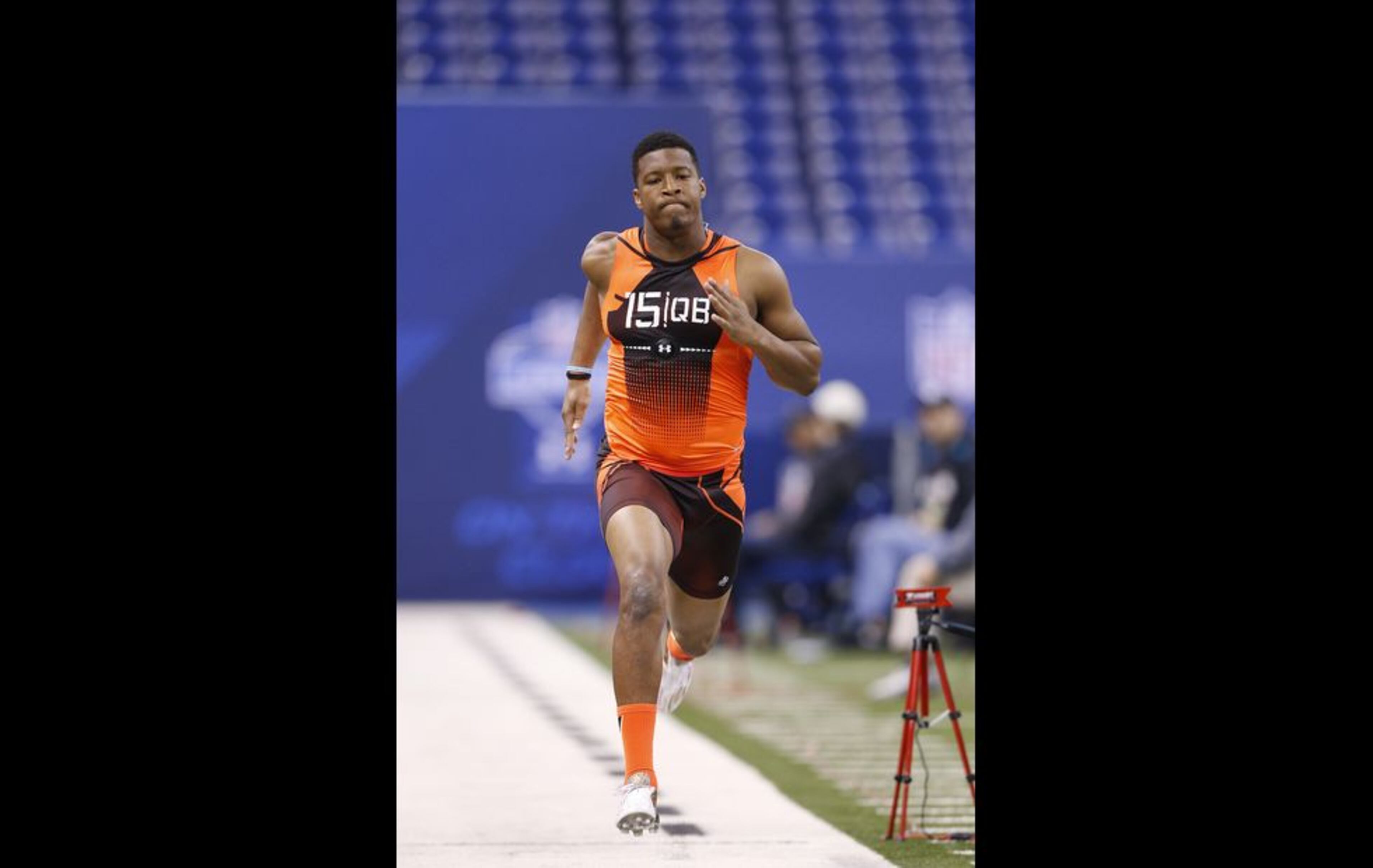 Quarterback Jameis Winston of Florida State runs the 40-yard dash during the 2015 NFL Scouting Combine at Lucas Oil Stadium on February 21, 2015 in Indianapolis, Indiana. (Photo by Joe Robbins/Getty Images)