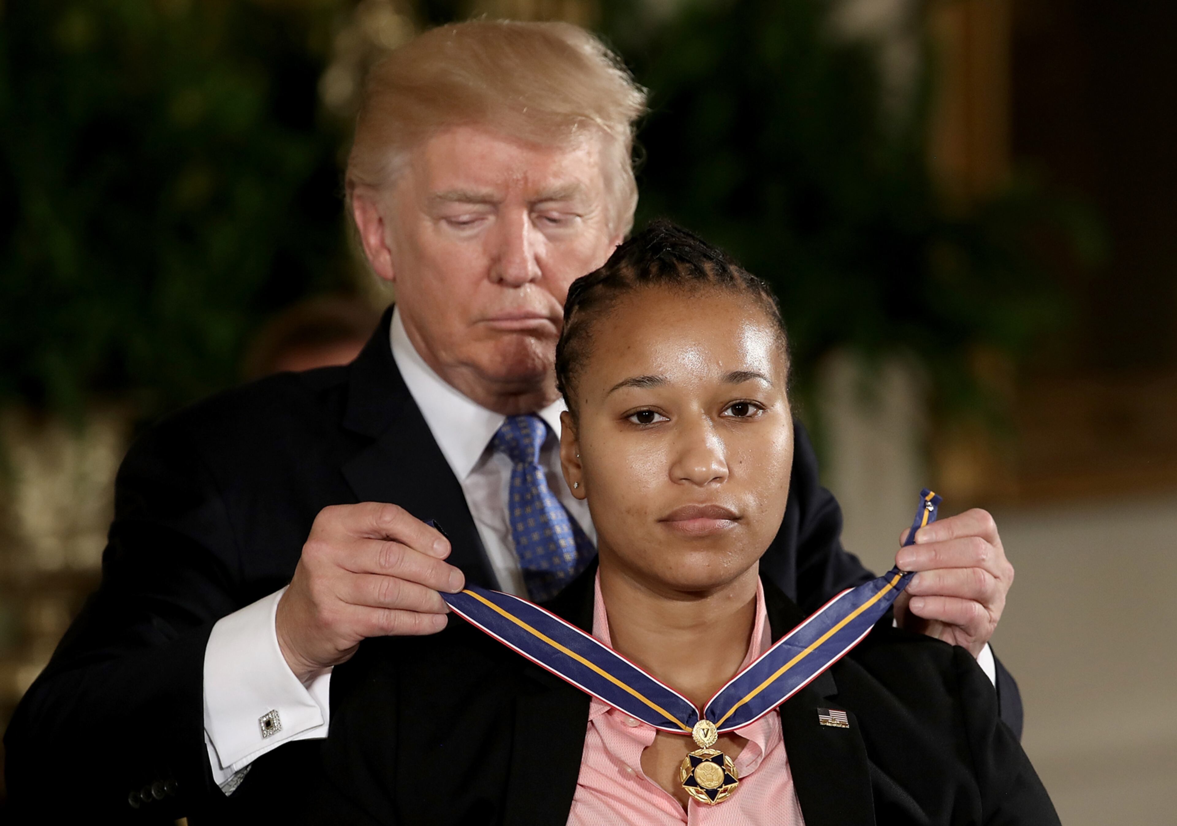 WASHINGTON, DC - JULY 27: U.S. President Donald Trump presents the Medal of Valor to U.S. Capitol Police officer Crystal Griner during an event in the East Room of the White House recognizing the first responders to the June 14 shooting involving Congressman Steve Scalise July 27, 2017 in Washington, DC. Scalise was among four people shot by James Hodgkinson during a congressional baseball team practice. (Photo by Win McNamee/Getty Images)
