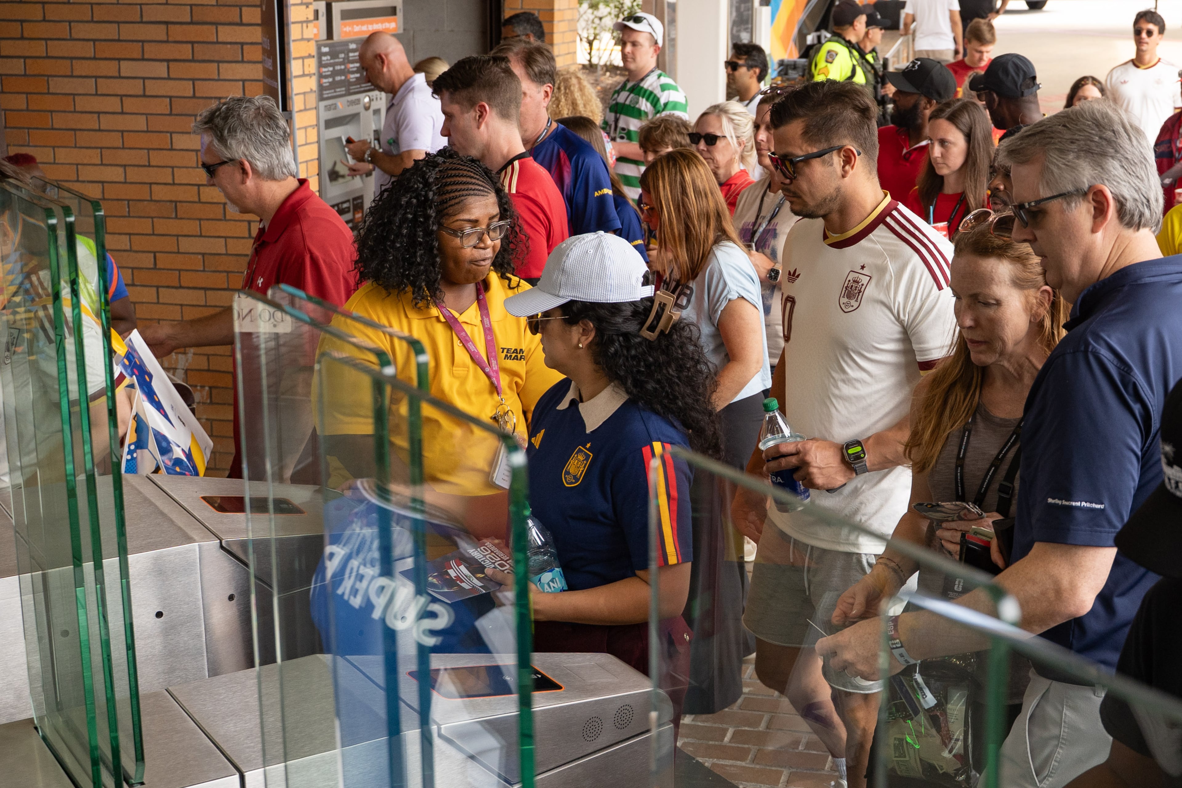 A MARTA employee helps fans access the Vine City station as fans commute to attend the FIFA World Cup match in Atlanta on Monday, June 15, 2026. (Ben Hendren for the AJC)