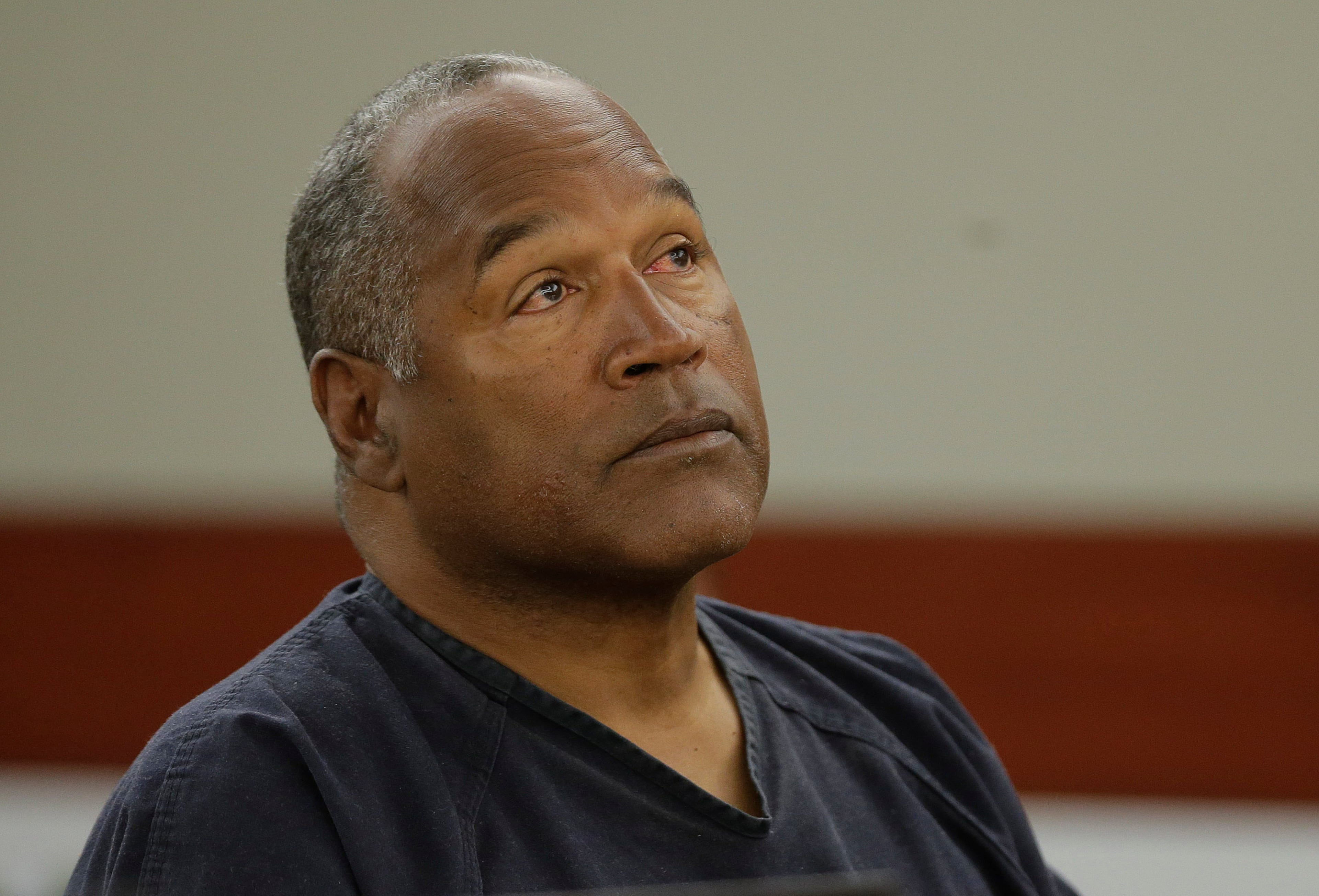 O.J. Simpson listens to testimony at an evidentiary hearing in Clark County District Court, Monday, May 13, 2013 in Las Vegas. Simpson, who is currently serving a nine-to-33-year sentence in state prison as a result of his October 2008 conviction on armed robbery and kidnapping charges, is seeking a new trial, claiming that trial lawyer Yale Galanter had conflicted interests and shouldn't have handled Simpson's armed case. (AP Photo/Julie Jacobson, Pool)