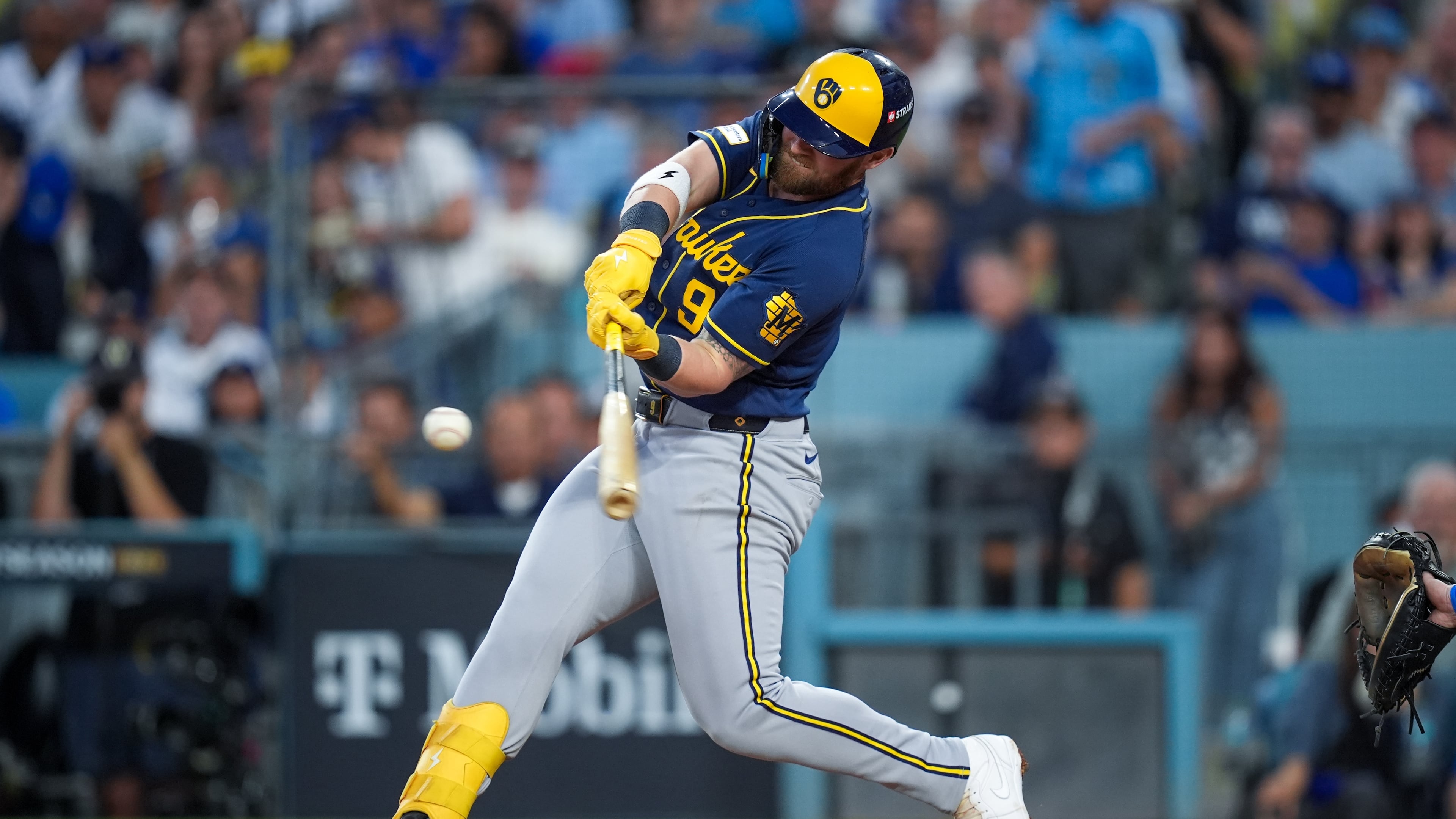 Milwaukee Brewers first baseman Jake Bauers connects for a two-RBI double during the fourth inning of Game 4 of baseball's National League Championship Series between the Milwaukee Brewers and the Los Angeles Dodgers, Thursday, Oct. 15, 2026, in Los Angeles. (AP Photo/Gregory Bull)