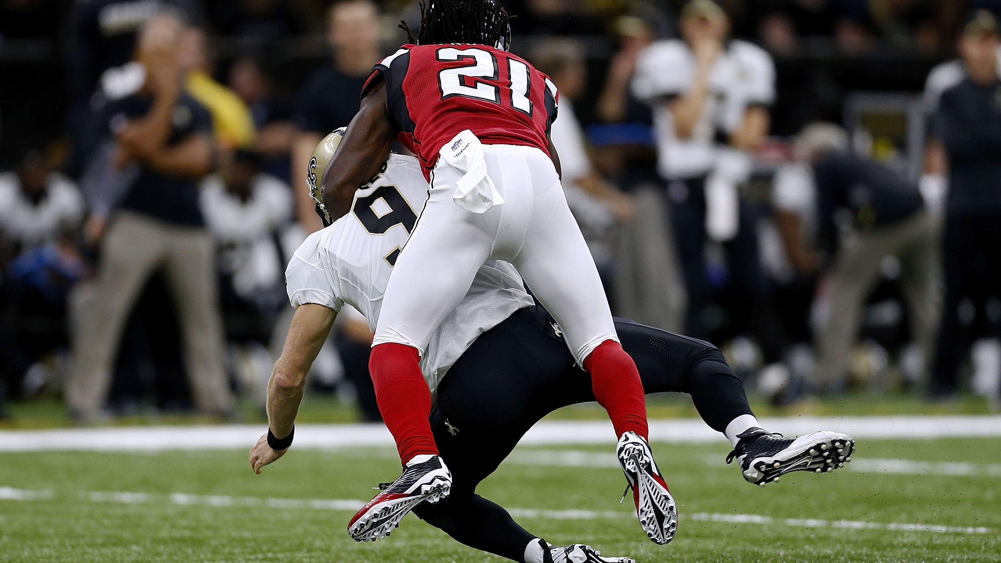 NEW ORLEANS, LA - SEPTEMBER 26: Desmond Trufant #21 of the Atlanta Falcons sacks Drew Brees #9 of the New Orleans Saints during the second half of a game at the Mercedes-Benz Superdome on September 26, 2016 in New Orleans, Louisiana. (Photo by Jonathan Bachman/Getty Images)