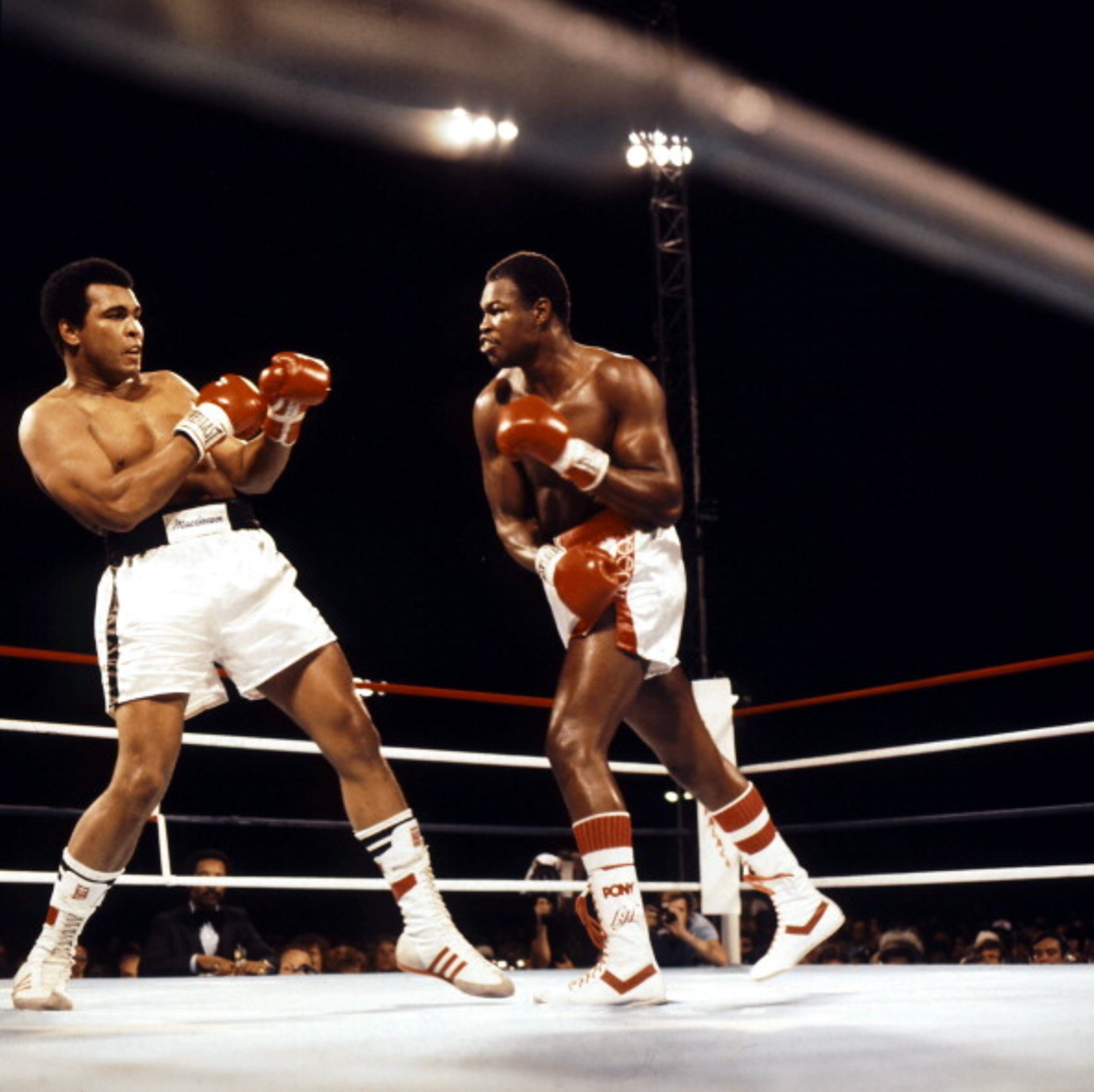 LAS VEGAS - OCTOBER 2,1980: Larry Holmes (R) moves in for the punch against Muhammad Ali during the fight at Caesars Palace in Las Vegas, Nevada. Larry Holmes won the WBC heavyweight title by a RTD 10. (Photo by: The Ring Magazine/Getty Images)
