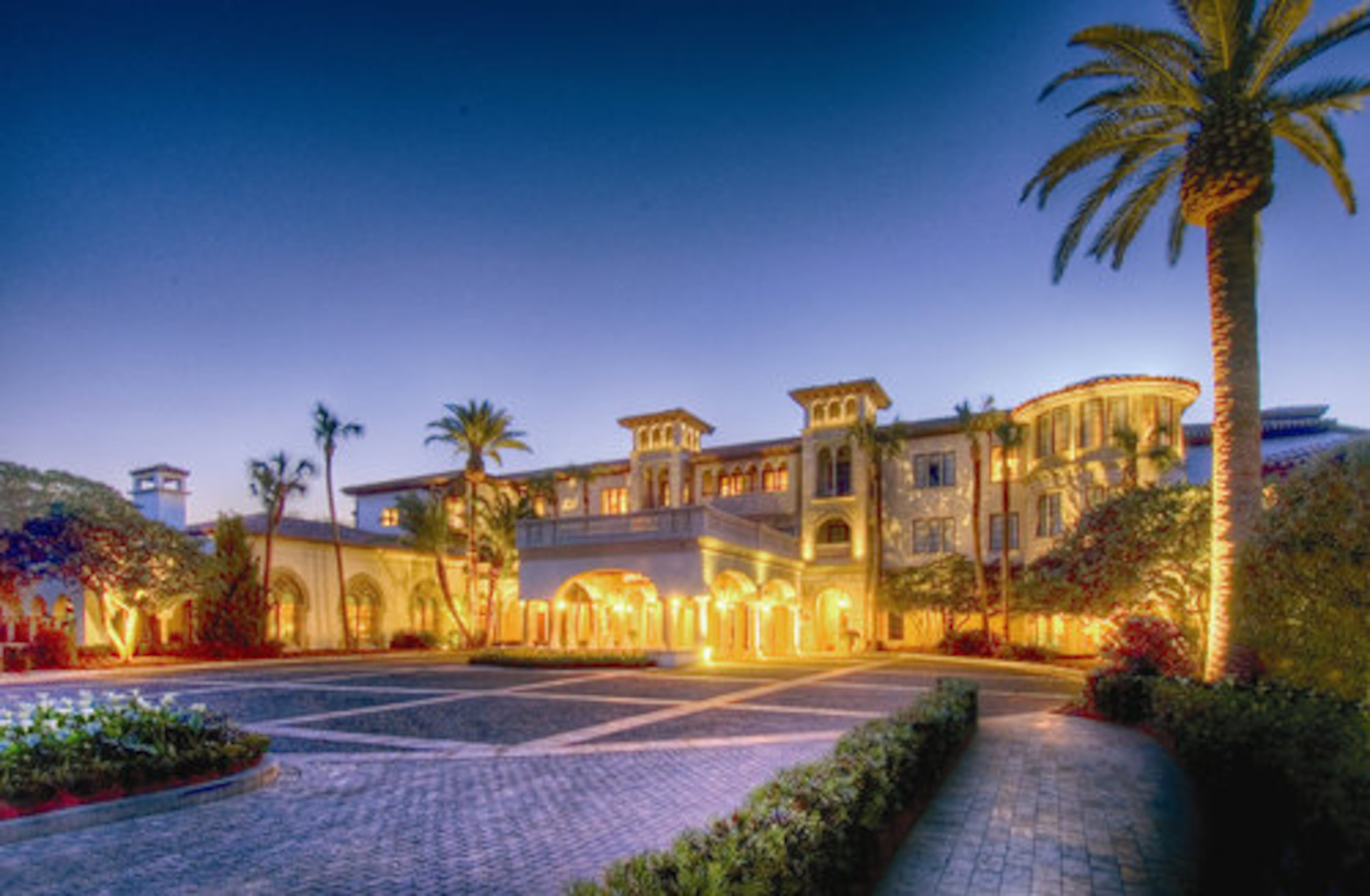 The new main building at the Cloister at Sea Island, which opened in 2006, echoes many of the architectural cues included in the 1928 design by Addison Mizner and is meant to suggest a luxurious old residence.