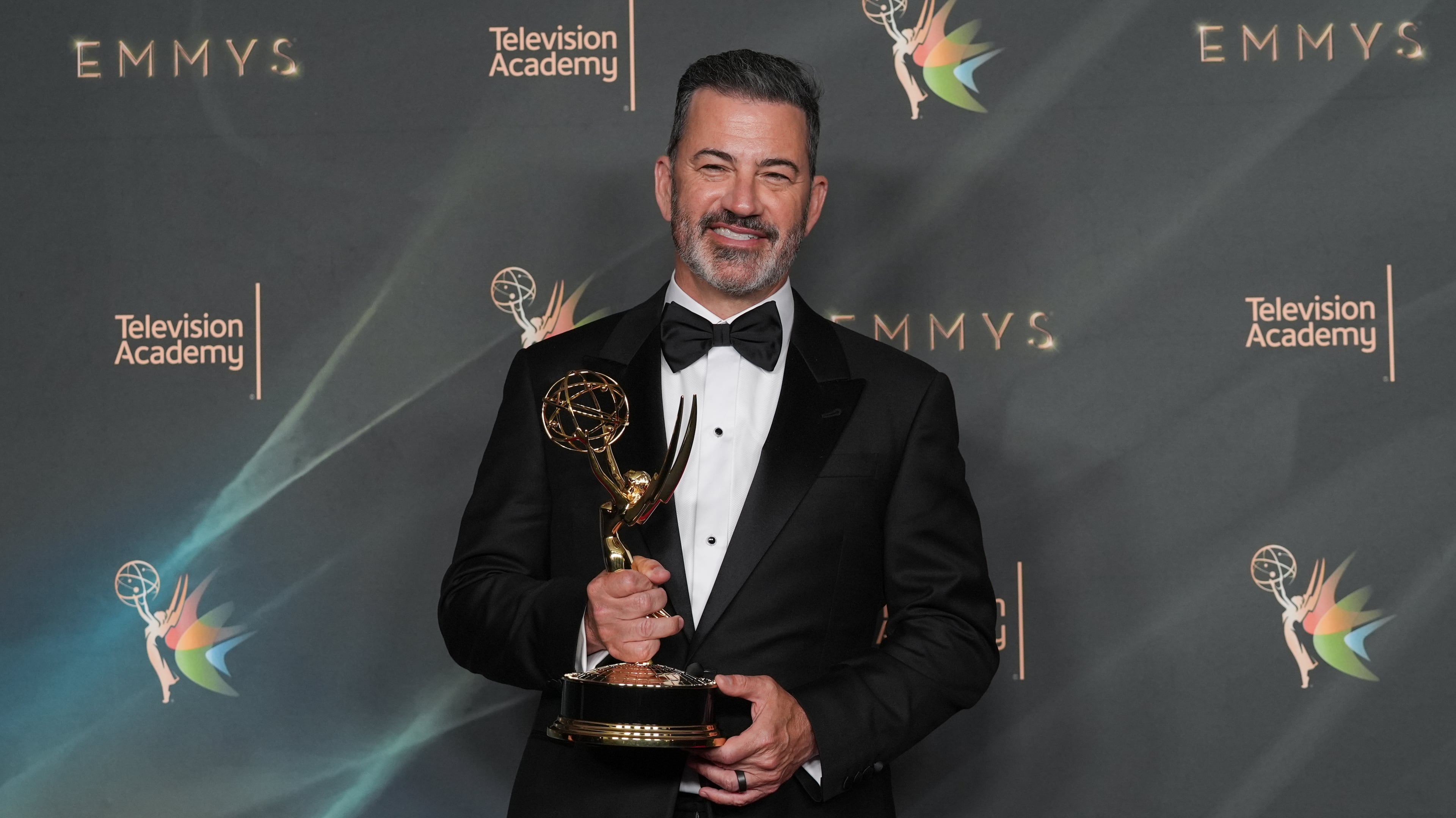 Jimmy Kimmel poses with the award for outstanding host for a game show for "Who Wants to Be a Millionaire?" during night one of the Creative Arts Emmy Awards on Saturday, Sept. 5, 2026, in Los Angeles. (AP Photo/Chris Pizzello)