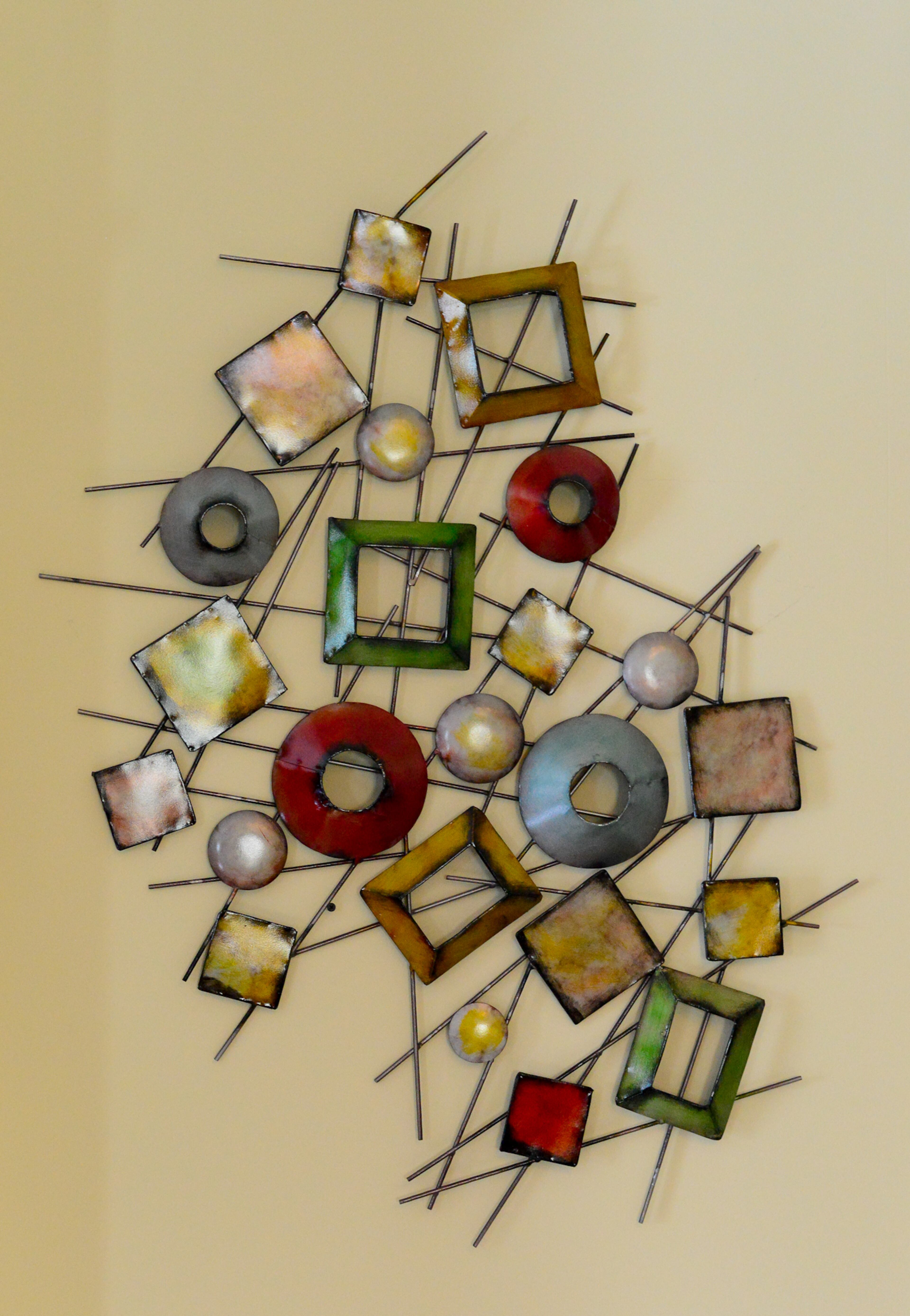 Frances Pace has filled her Ellenwood home with various kinds of artwork, including this piece from Garden Ridge that hangs in the family room.