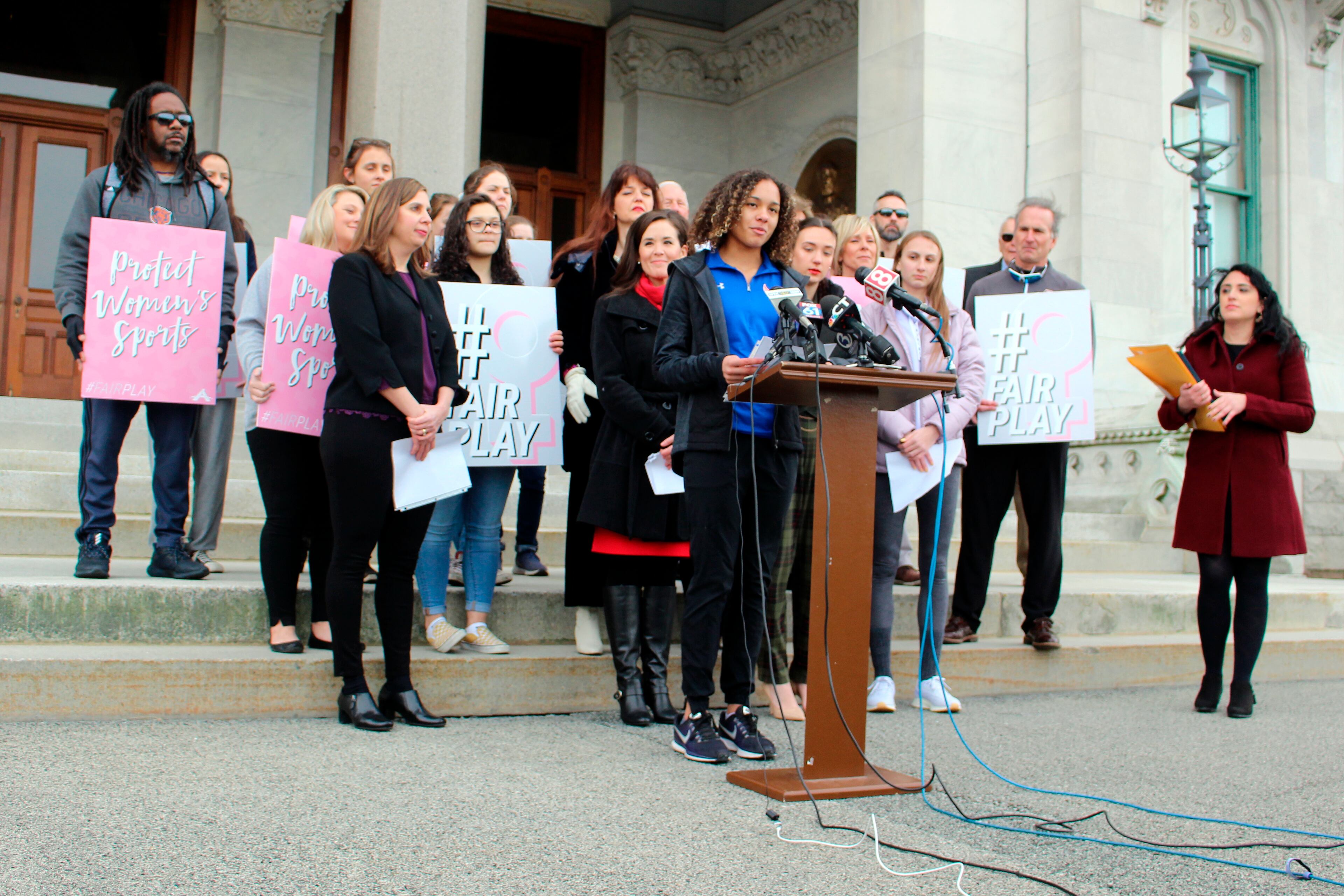 Danbury High School sophomore Alanna Smith speaks during a news conference at the Connecticut State Capitol .
