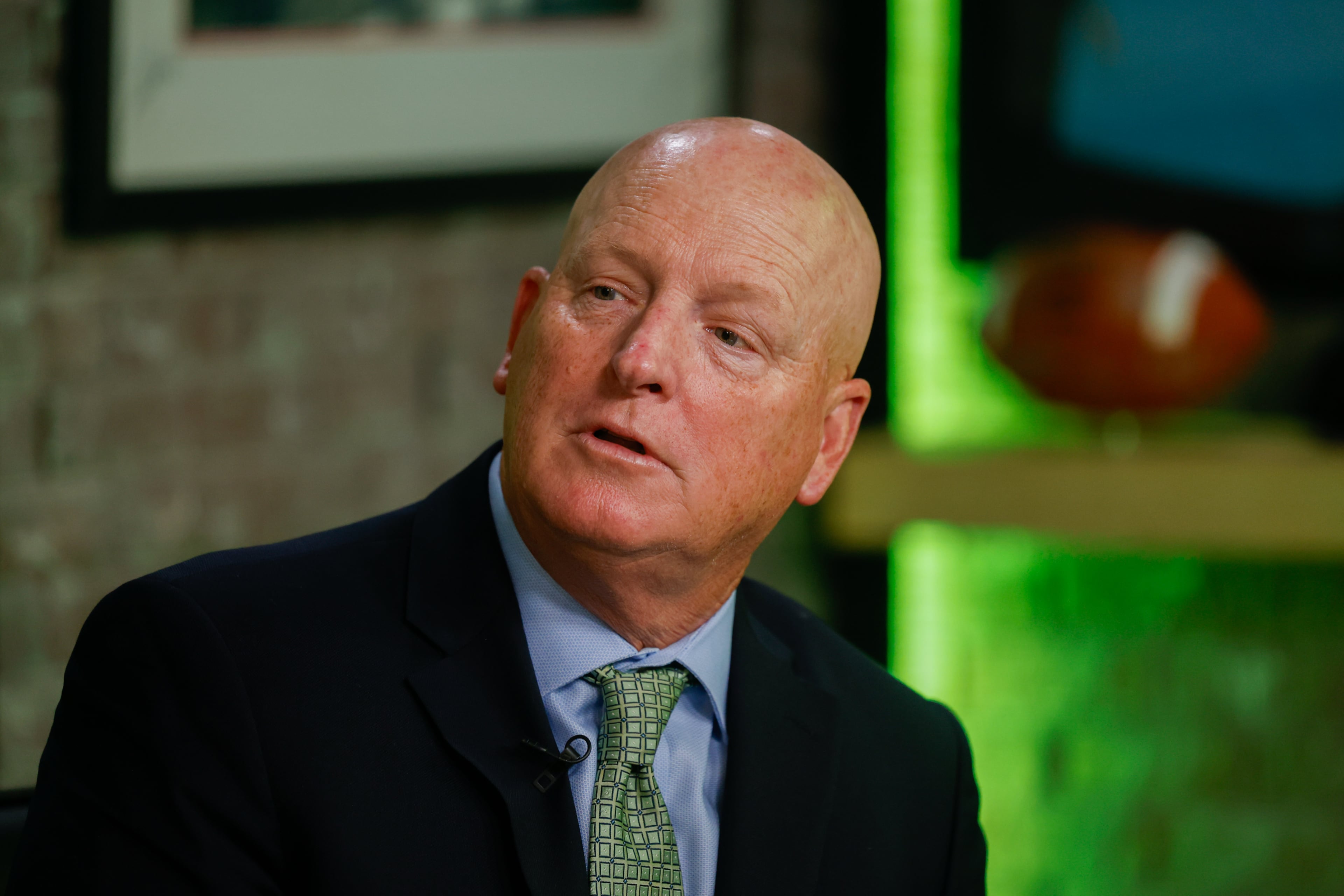 Blessed Trinity coach Ed Dudley appears during the taping of the Super 11 reveal show at Score ATL in Roswell on Aug. 3, 2026. (Arvin Temkar/AJC)