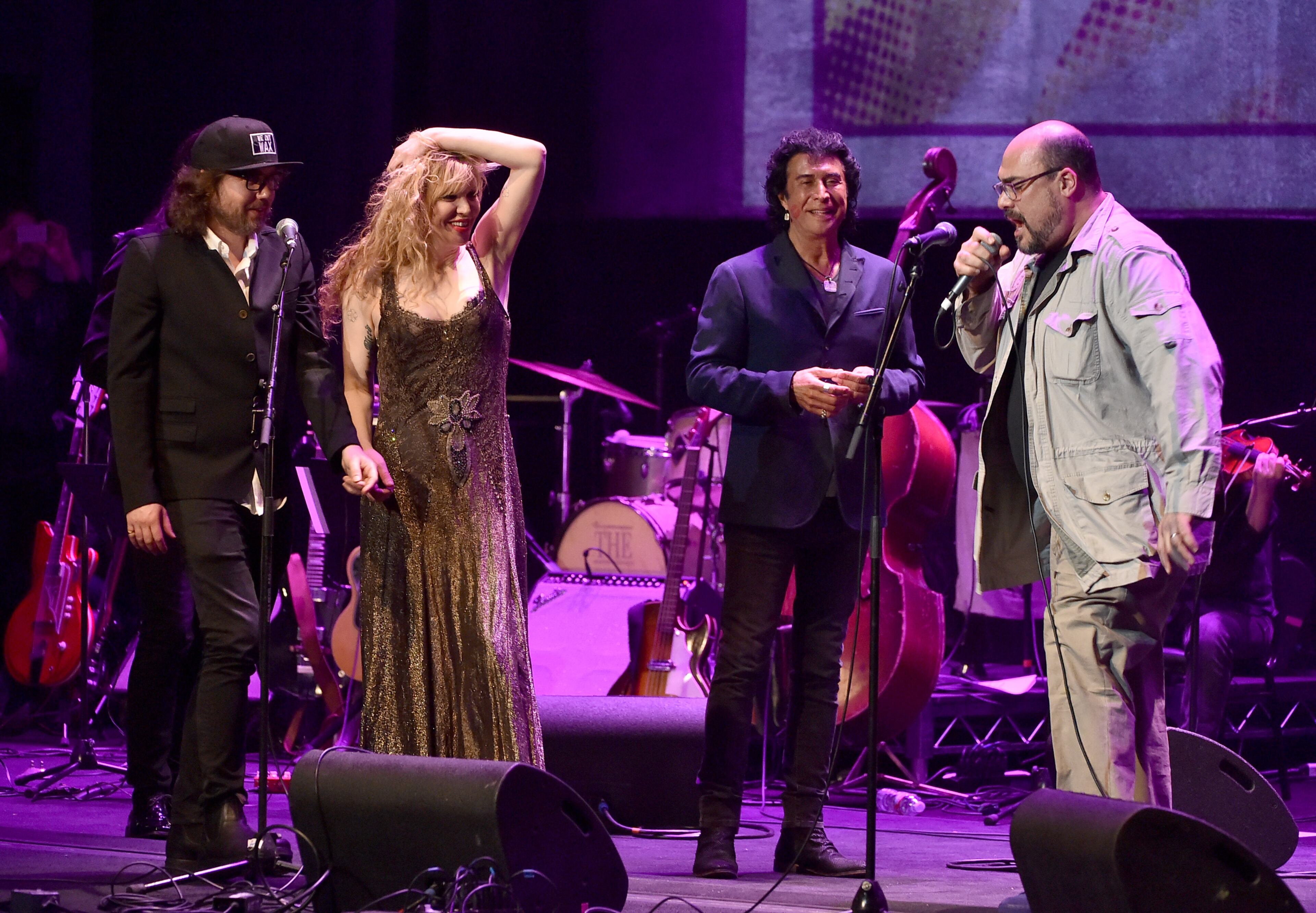 LOS ANGELES, CA - APRIL 07: (L-R) Musicians Kevin Drew, Courtney Love, Andy Kim and Eric Mingus perform onstage during The David Lynch Foundation's DLF Live Celebration of the 60th Anniversary of Allen Ginsberg's "HOWL" with Music, Words, and Funny People at The Theatre at Ace Hotel on April 7, 2015 in Los Angeles, California. (Photo by Kevin Winter/Getty Images)