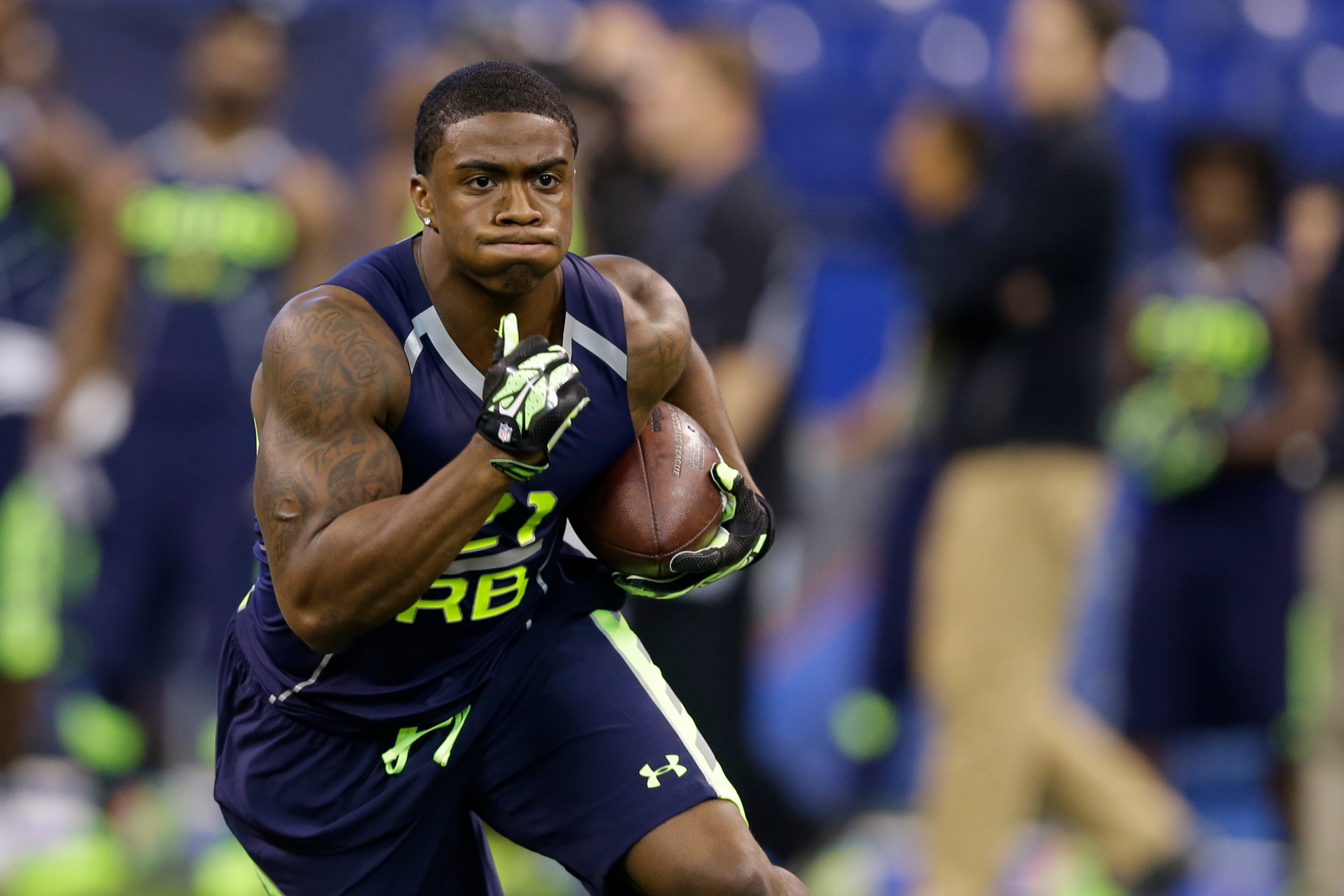 Georgia Southern running back Jerick Mckinnon runs a drill at the NFL football scouting combine in Indianapolis, Sunday, Feb. 23, 2014. (AP Photo/Michael Conroy)