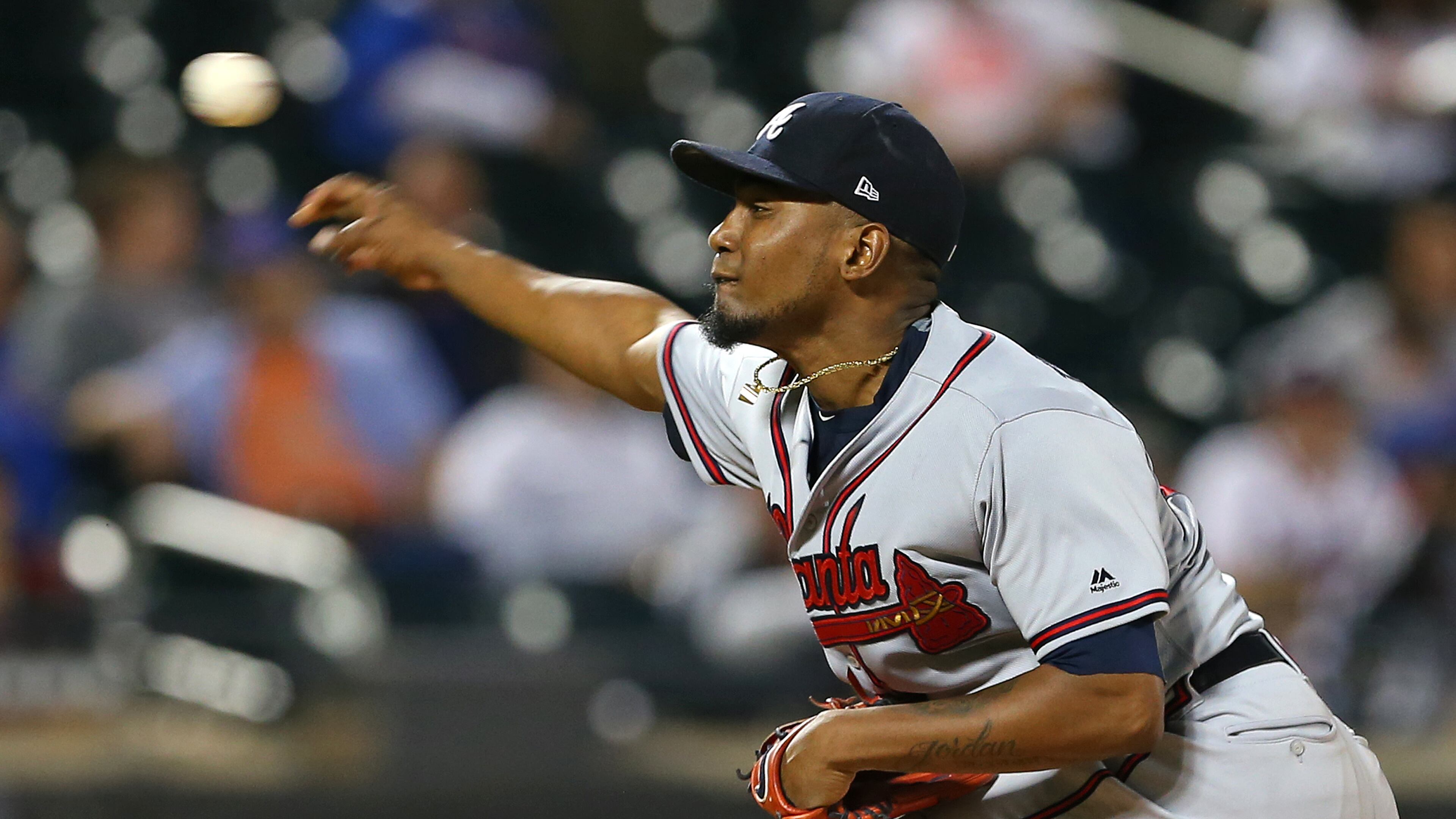 Pitcher Julio Teheran #49 of the Atlanta Braves delivers a pitch against the New York Mets. (Photo by Rich Schultz/Getty Images)