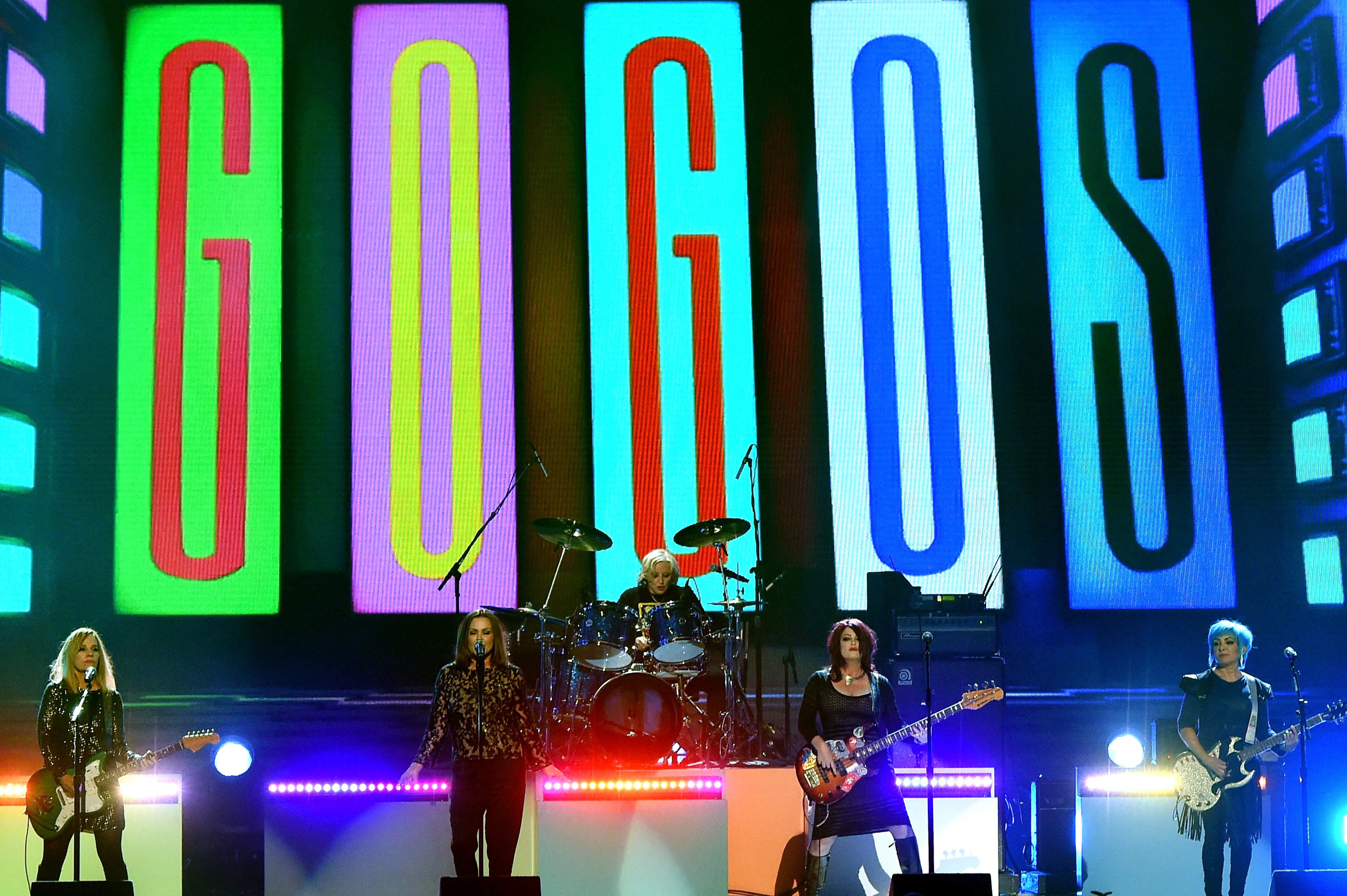 LAS VEGAS, NV - MAY 22: (L-R) Musicians Charlotte Caffey, Belinda Carlisle, Gina Schock, Paula Jean Brown and Jane Wiedlin of The Go-Go's perform onstage during the 2016 Billboard Music Awards at T-Mobile Arena on May 22, 2016 in Las Vegas, Nevada. (Photo by Kevin Winter/Getty Images)