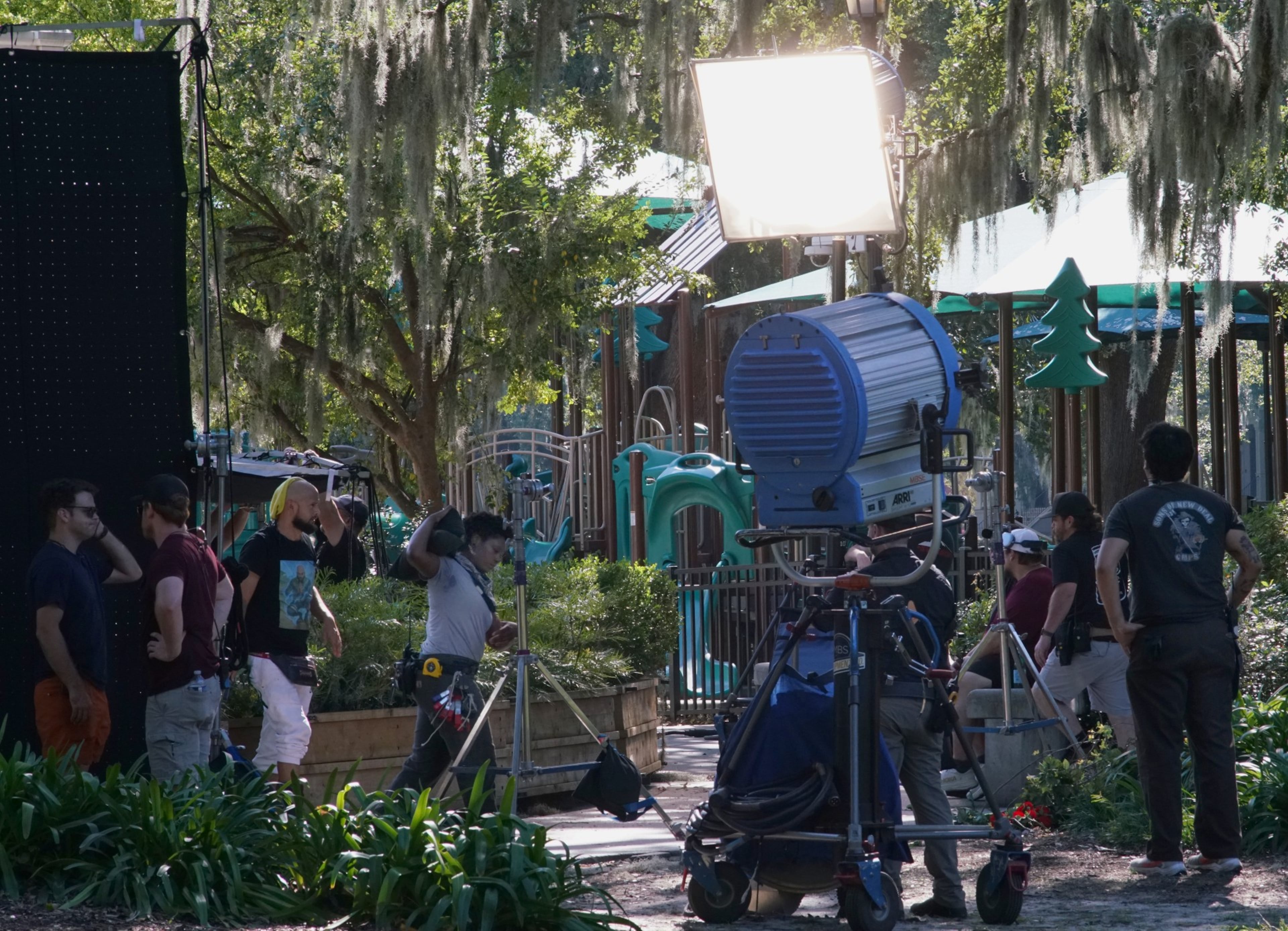 Film crews work between takes of the Netflix series "Sweet Magnolias," shot in 2025 at Savannah's Forsyth Park. (Courtesy of Savannah Regional Film Commission)