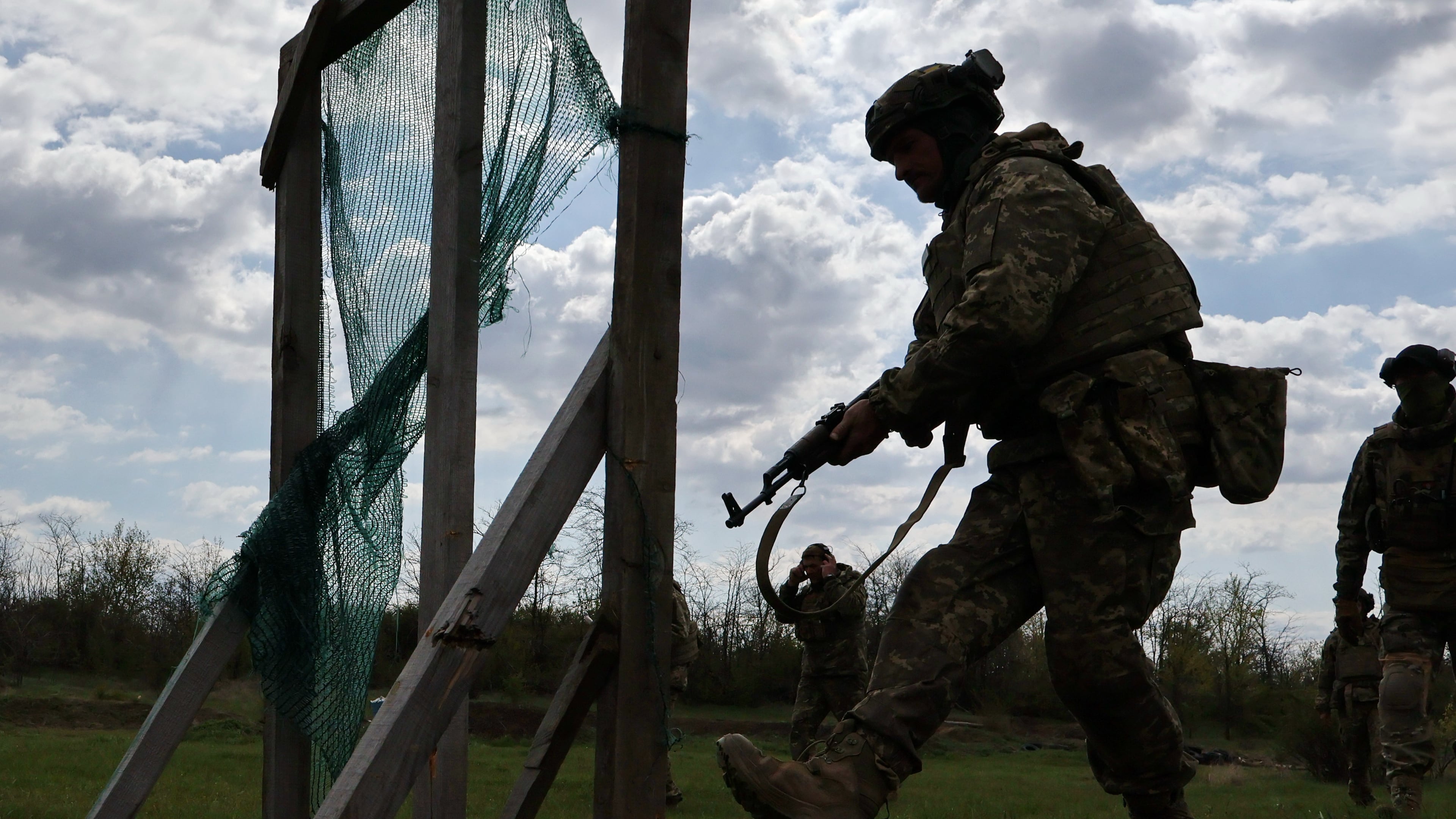 In this photo provided by Ukraine's 65th Mechanized Brigade press service, recruits practice military skills at a training ground near the frontline in the Zaporizhzhia region, Ukraine, Wednesday, April 29, 2026. (Andriy Andriyenko/Ukraine's 65th Mechanized Brigade via AP)