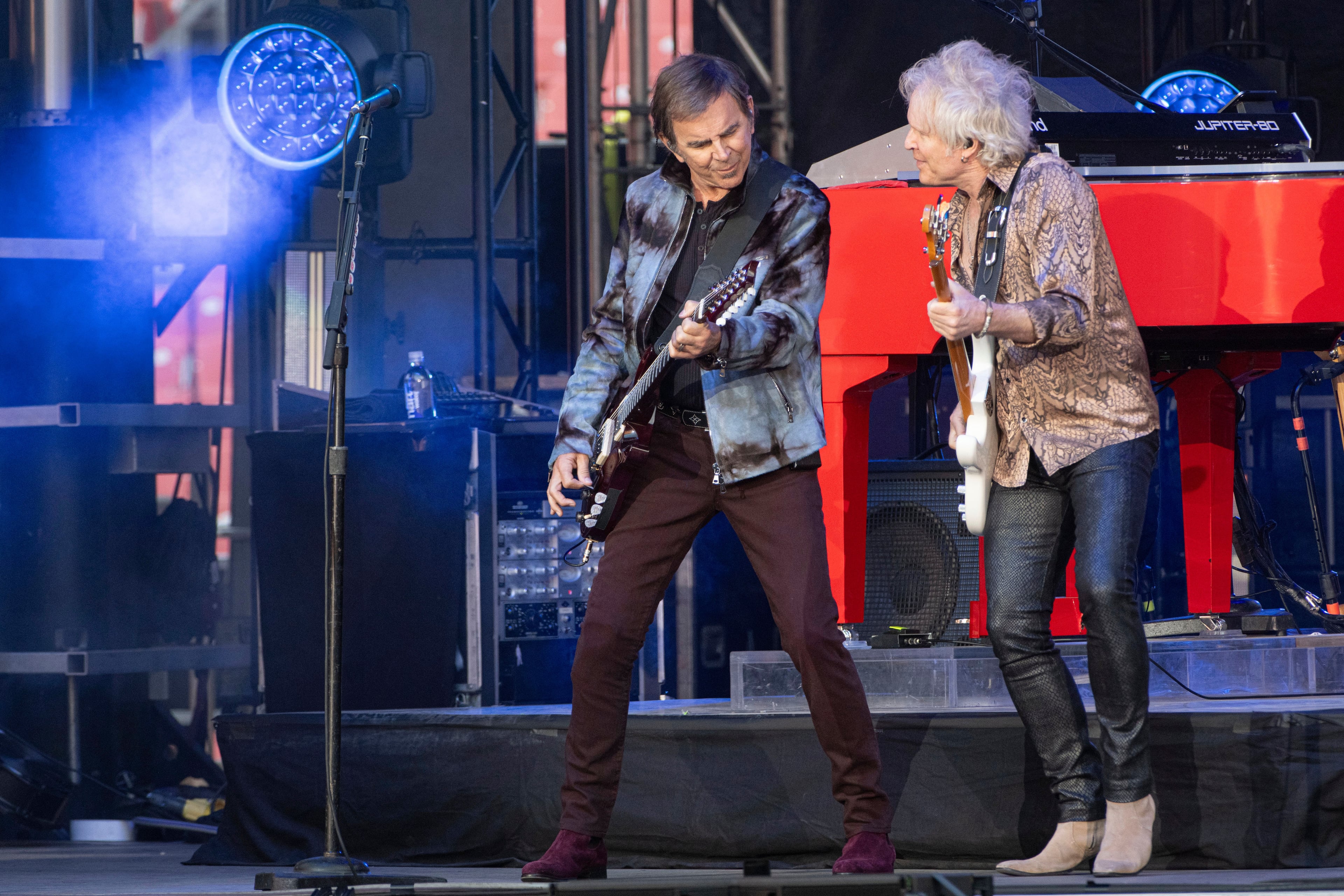 Journey guitarists Jonathan Cain, left, and Todd Jensen perform at the Cleveland Browns NFL football draft party in Cleveland, on April 24, 2025. (Phil Long/AP File)