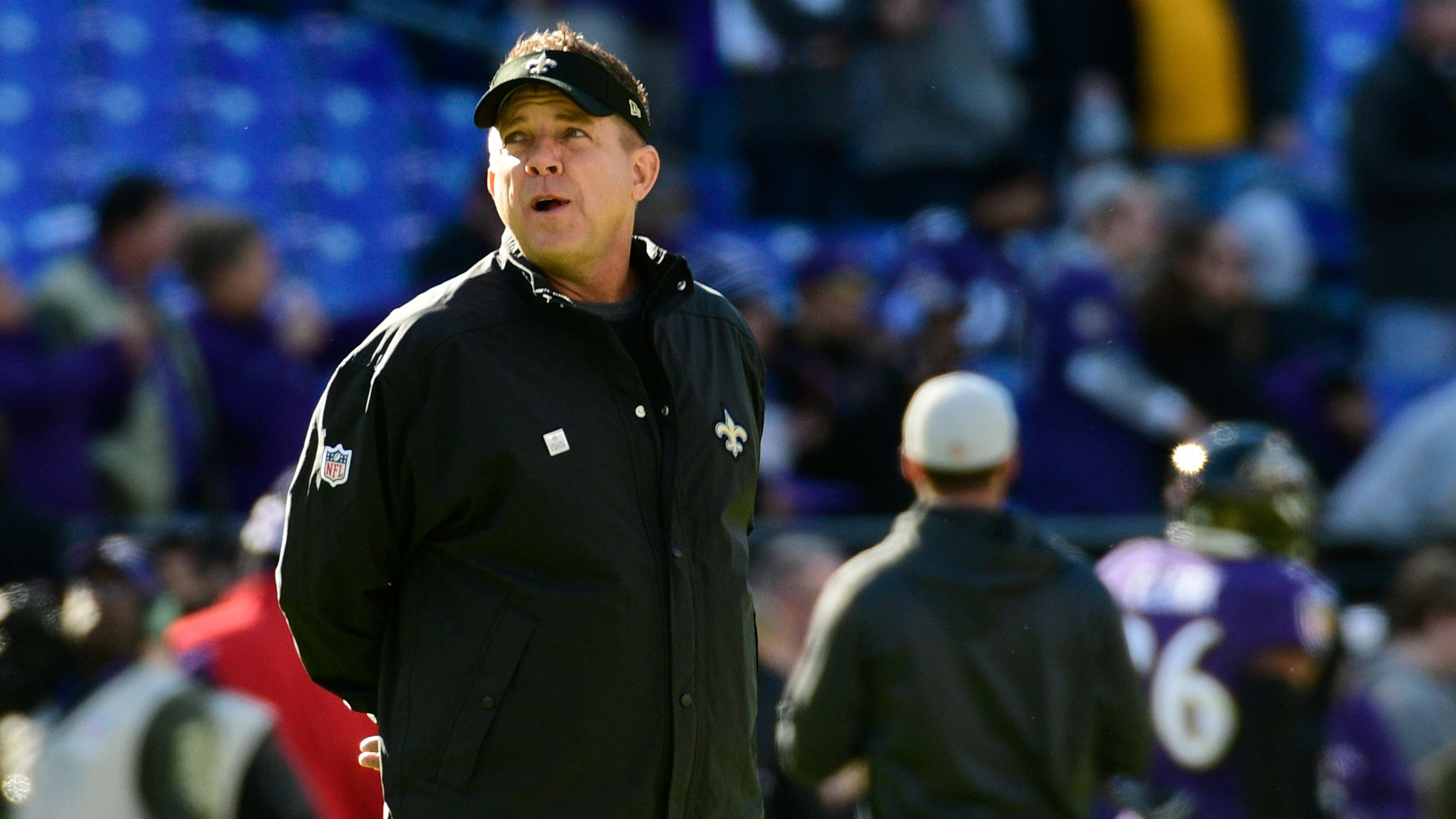 New Orleans Saints head coach Sean Payton watches his team warm up before the game against the Baltimore Ravens at M&T Bank Stadium.