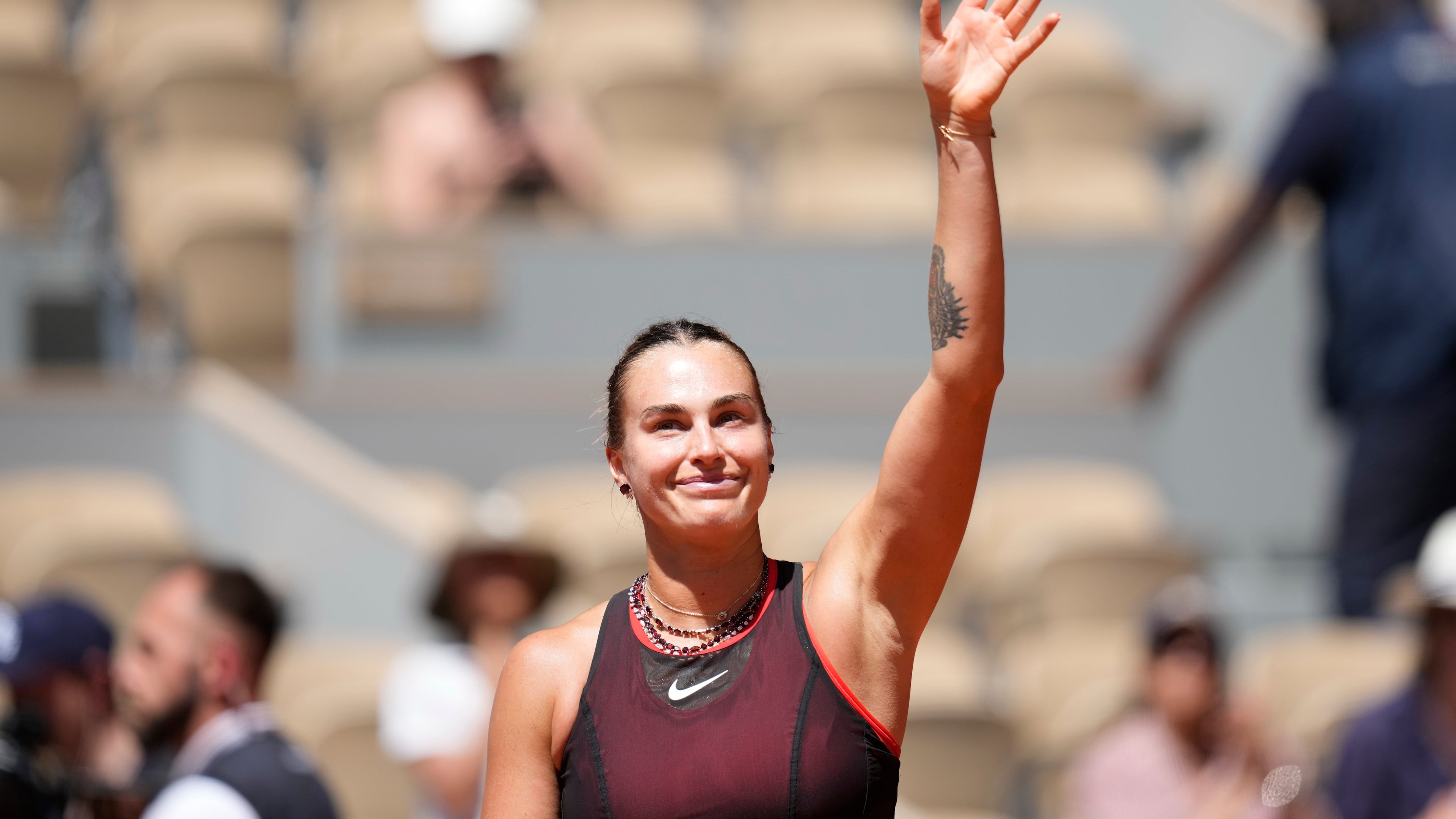 Aryna Sabalenka of Belarus celebrates after winning against Jessica Bouzas Maneiro of Spain during their first round women's singles tennis match at the French Open tennis tournament in Paris, Tuesday, May 26, 2026. (AP Photo/Christophe Ena)