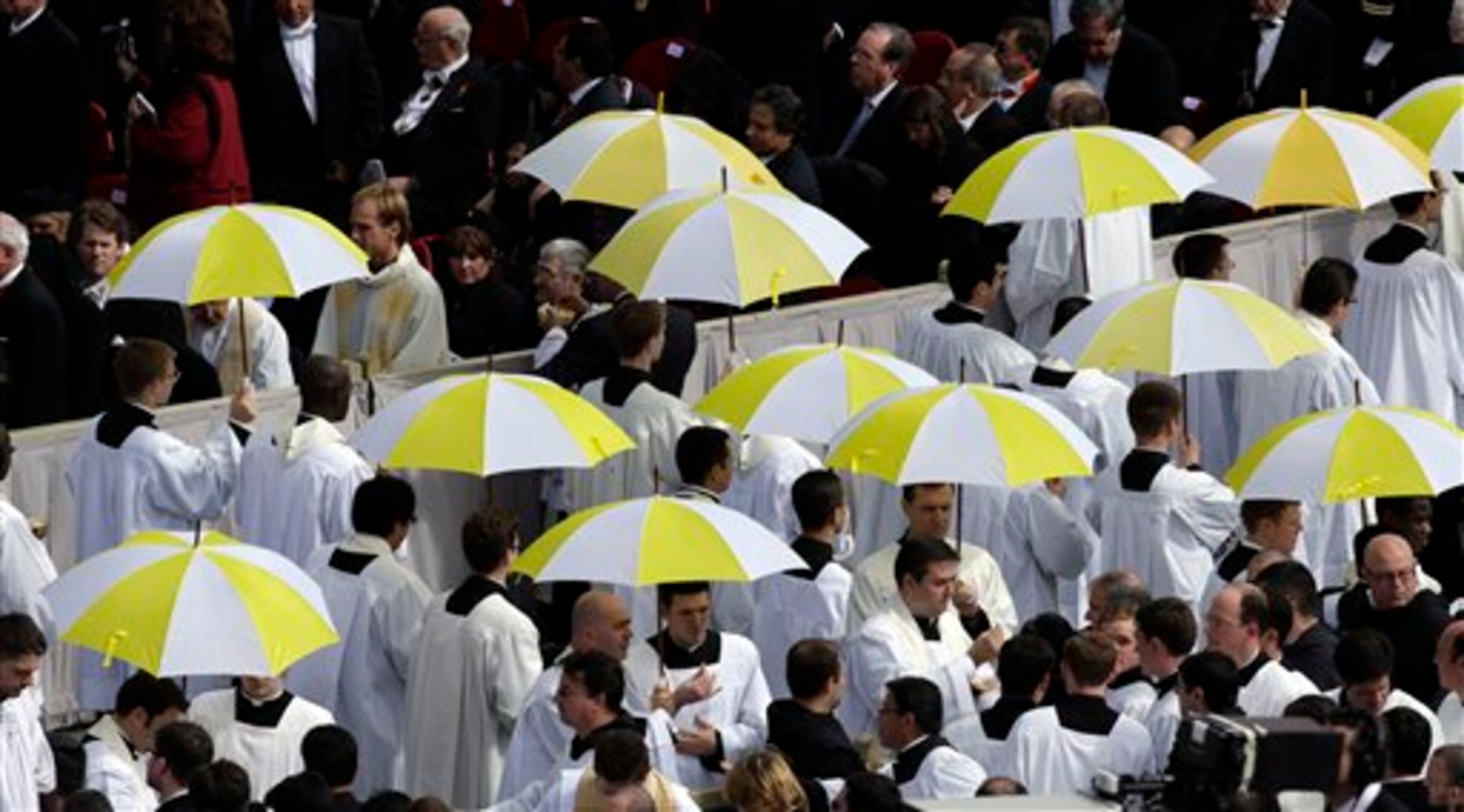 Priests attend Pope Francis' installation Mass in St. Peter's Square at the Vatican, Tuesday, March 19, 2013. Pope Francis has urged princes, presidents, sheikhs and thousands of ordinary people gathered for his installation Mass to protect God's creation, the weakest and the poorest of the world. (AP Photo/Andrew Medichini)