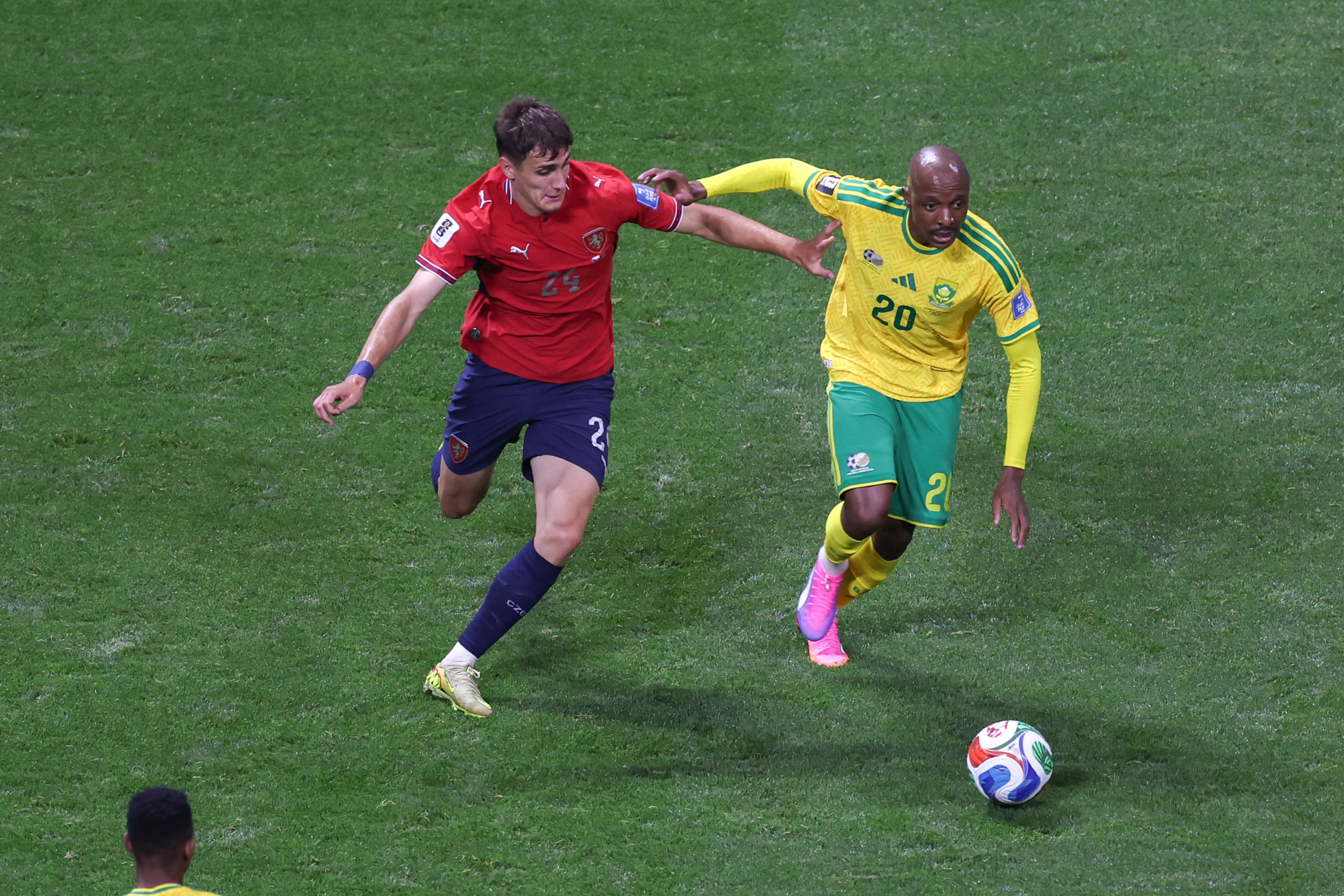 Czechia midfielder Alexandr Sojka (left) and South Africa defender Olwethu Makhanya scramble for the ball during the first half of the Czechia vs. South Africa game at the FIFA World Cup at Atlanta Stadium on Thursday, June 18, 2026. (Arvin Temkar/AJC)