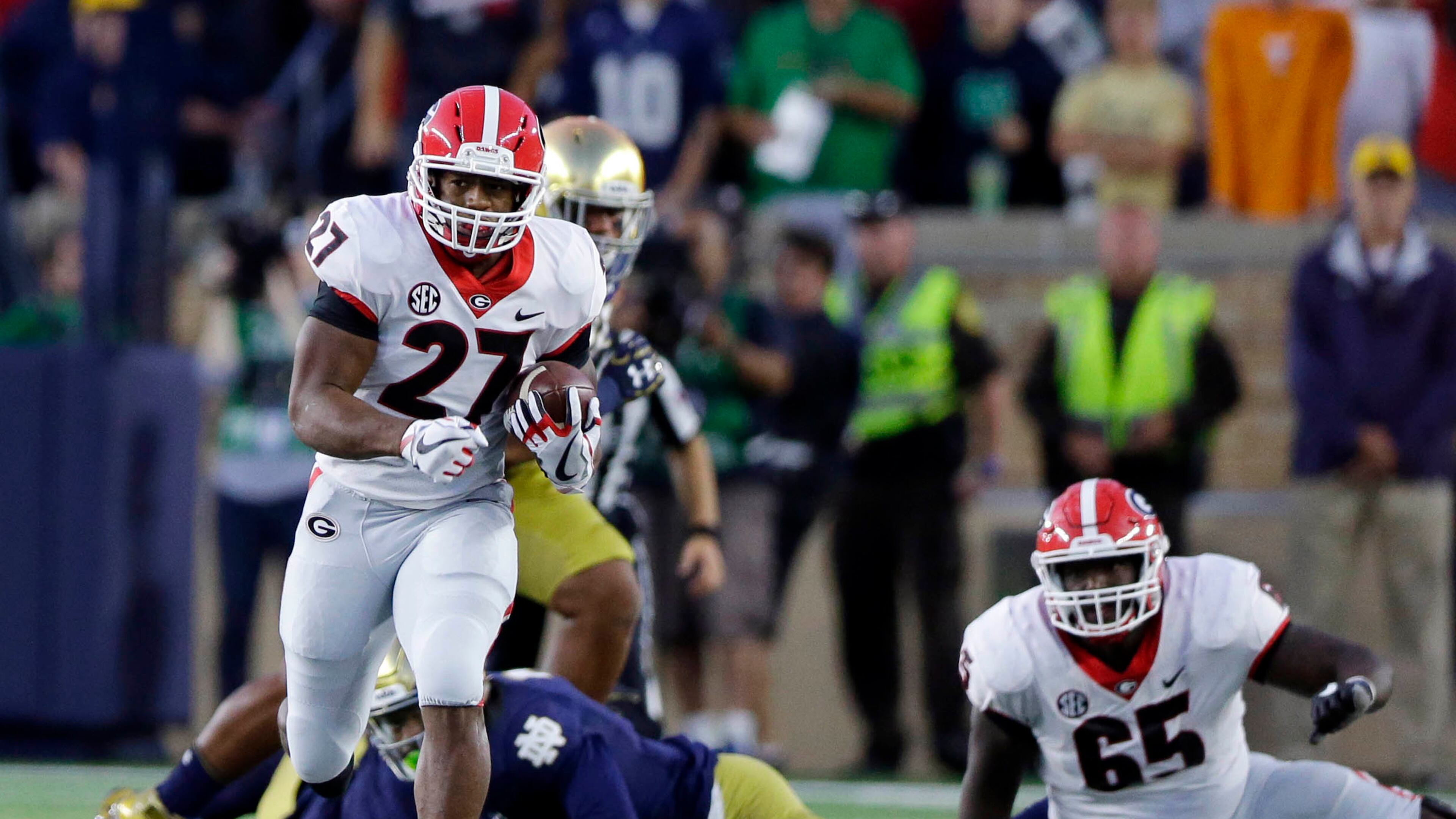 Georgia running back Nick Chubb (27) runs against Notre Dame during the first half of an NCAA college football game in South Bend, Ind., Saturday, Sept. 9, 2017. (AP Photo/Michael Conroy)