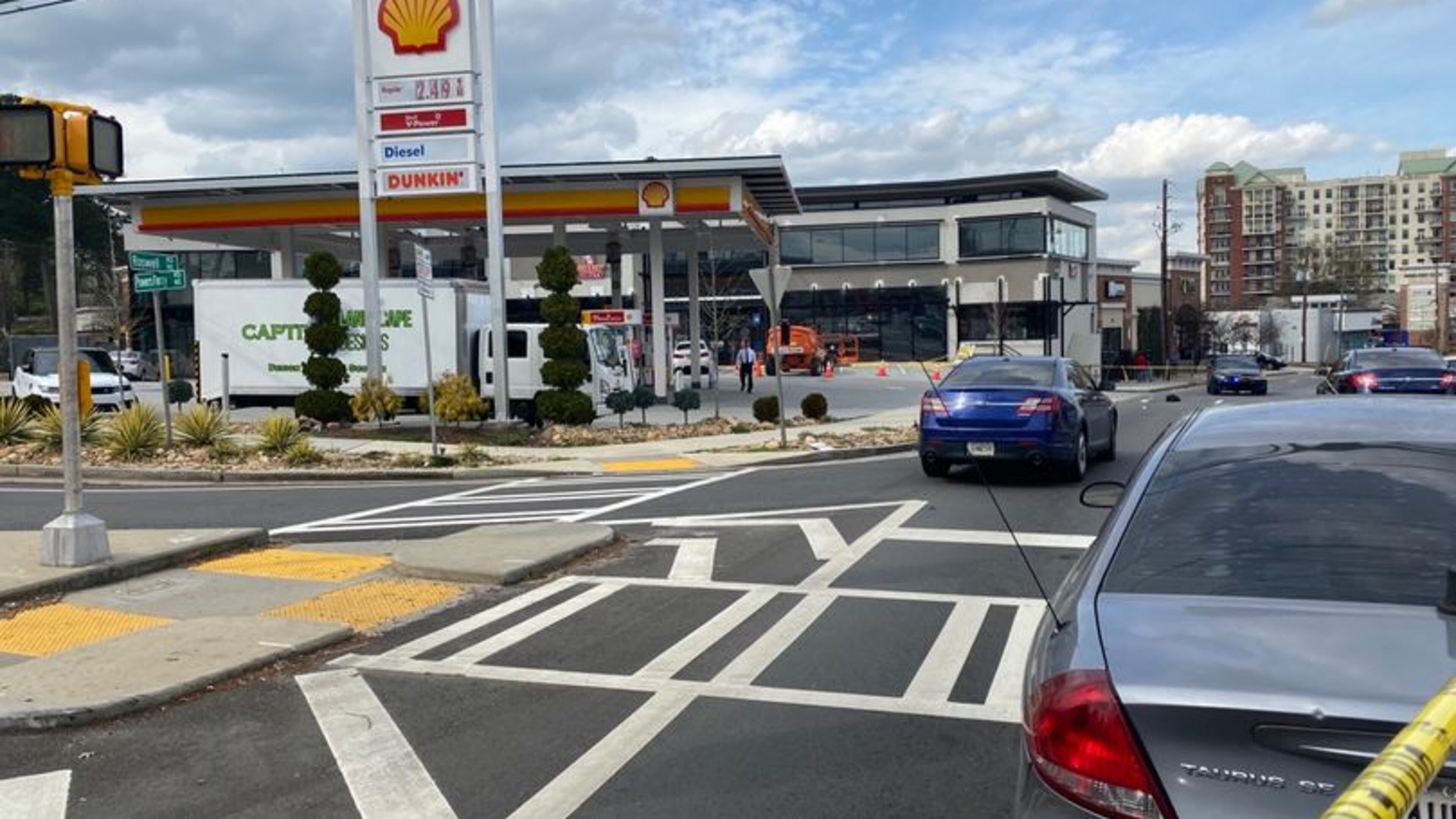 The shooting took place at a Shell station at the intersection of Powers Ferry and Roswell roads.