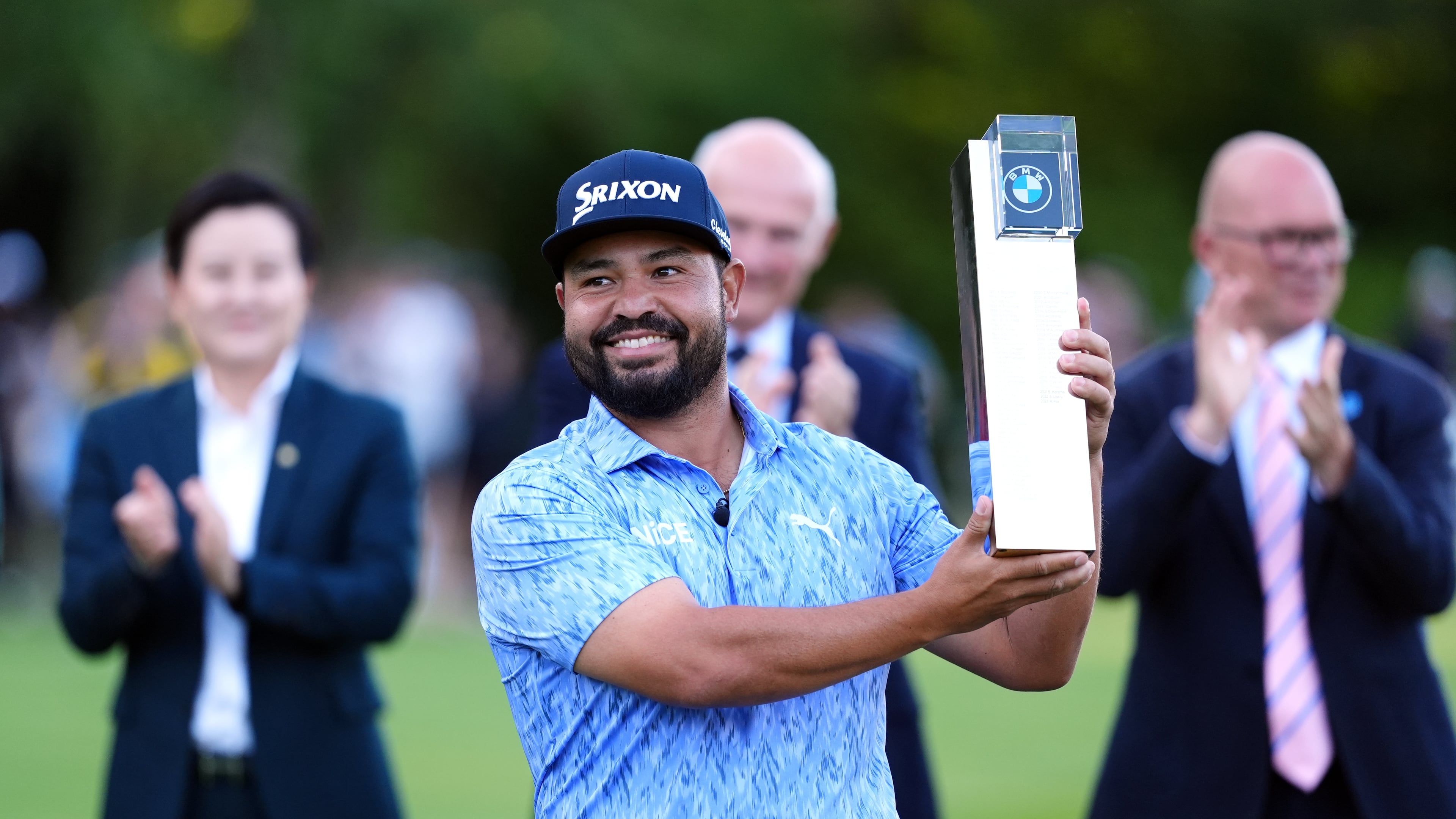 J. J. Spaun of United States lifts the trophy after winning the PGA Championship at Wentworth Golf Club in Virginia Water, England, Sunday Sept. 20, 2026. (Adam Davy/PA via AP)
