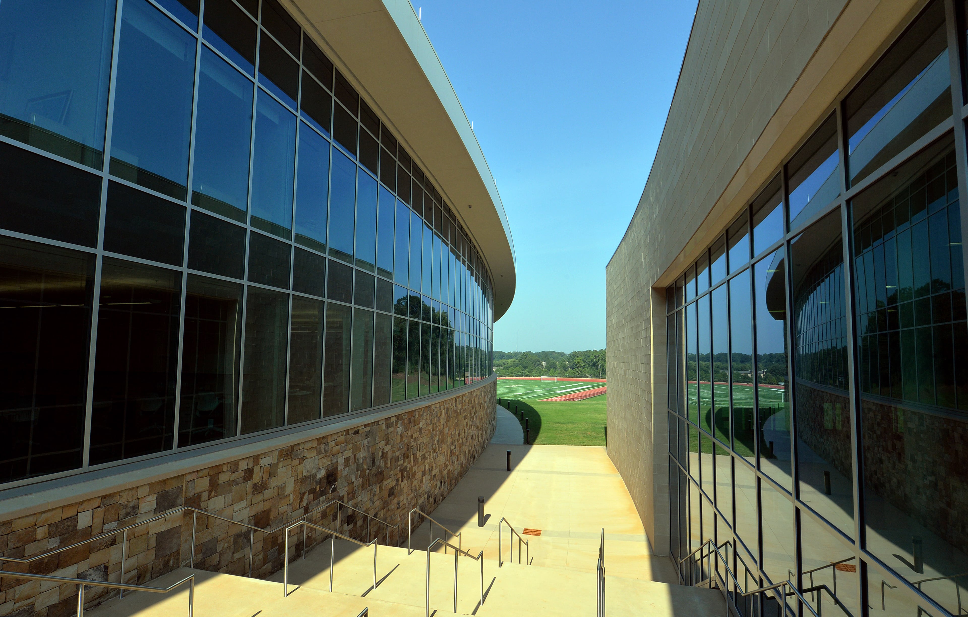 The Charles R. Drew Charter School classroom building is at left and the gym building is on the right.