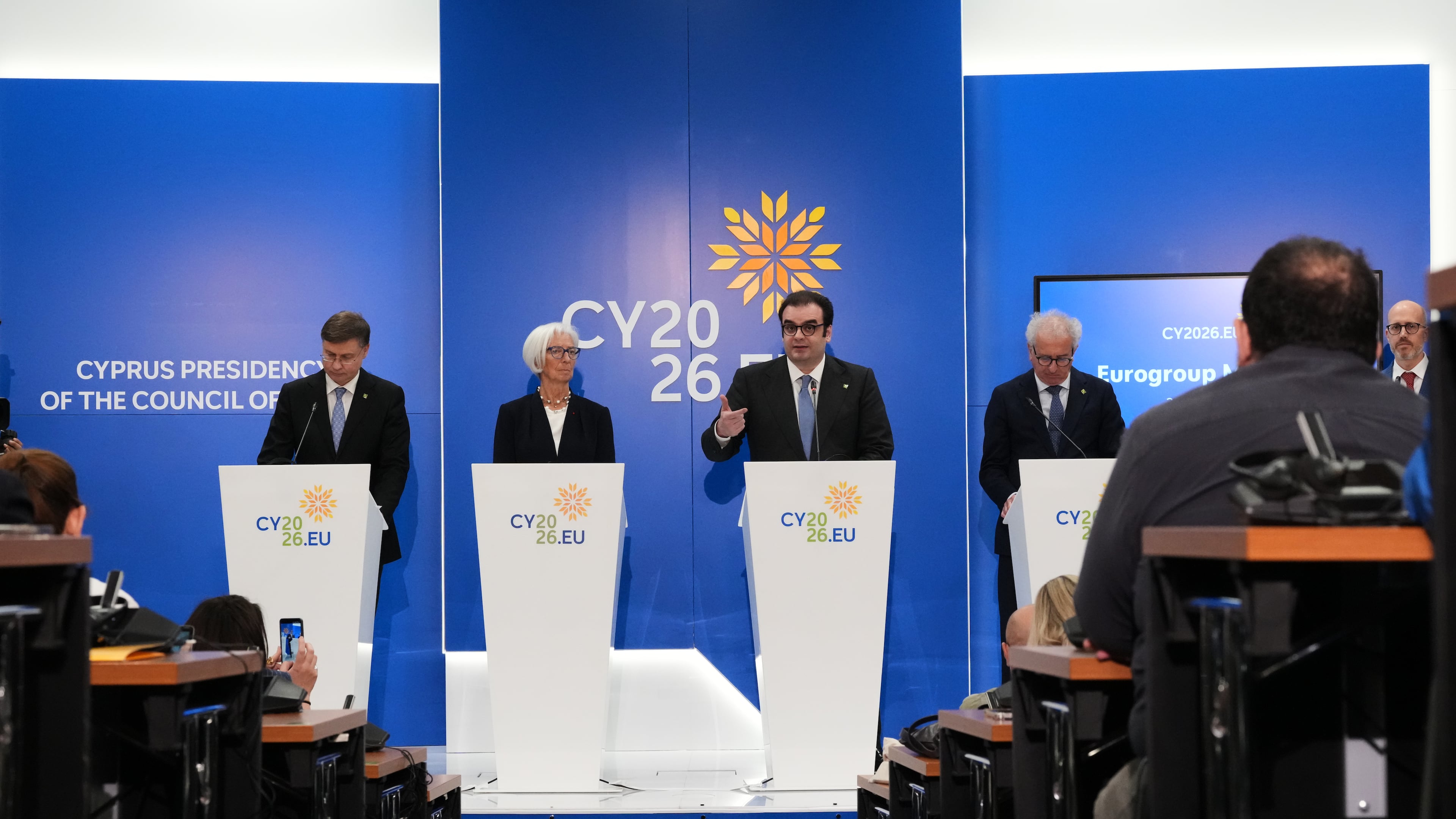 From left to right, European Commissioner for Economy and Productivity, Implementation and Simplification Valdis Dombrovskis, European Central Bank President Christine Lagarde, President of the Eurogroup Kyriakos Pierrakakis, Managing Director and the European Stability Mechanism Pierre Gramegna talk to the media during the Eurogroup finance ministers meeting in capital Nicosia, Cyprus, Friday, May 22, 2026. (AP Photo/Petros Karadjias)