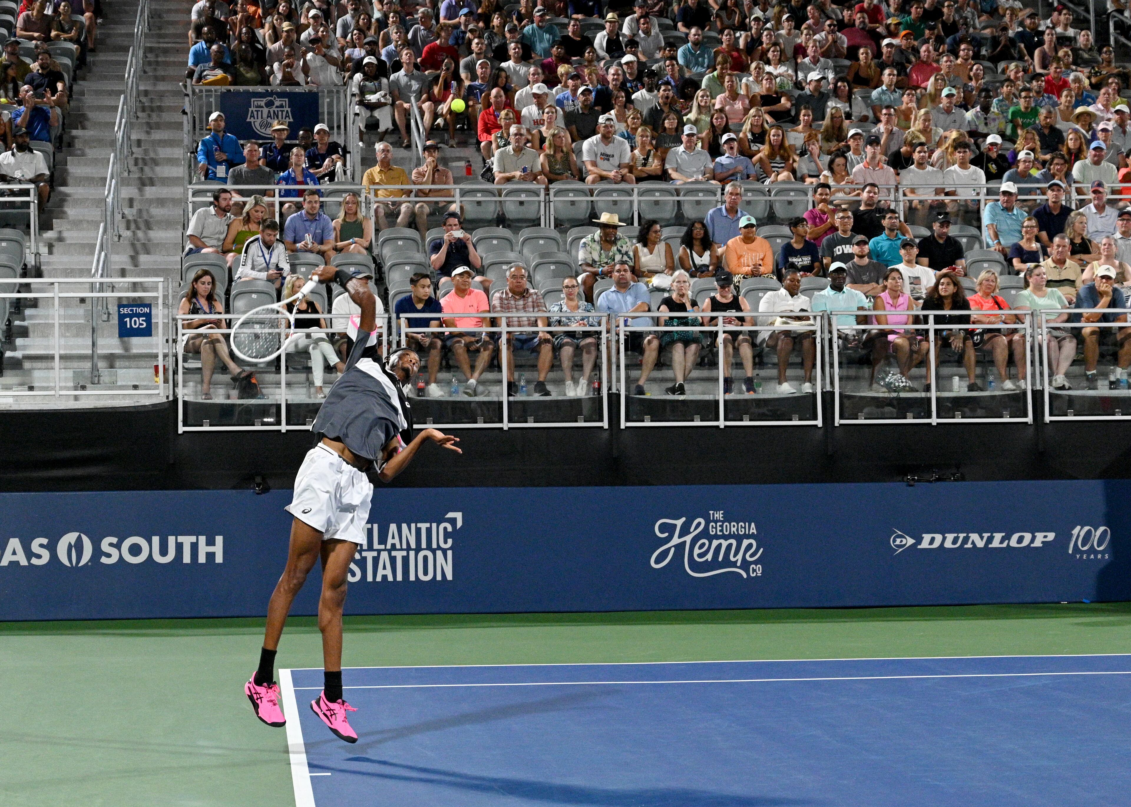Christopher Eubanks serves the ball against Aleksandar Vukic during a quarterfinal match at the 2023 Atlanta Tennis Open at Atlantic Station, Friday, July 28, 2023, in Atlanta. (Hyosub Shin / Hyosub.Shin@ajc.com)